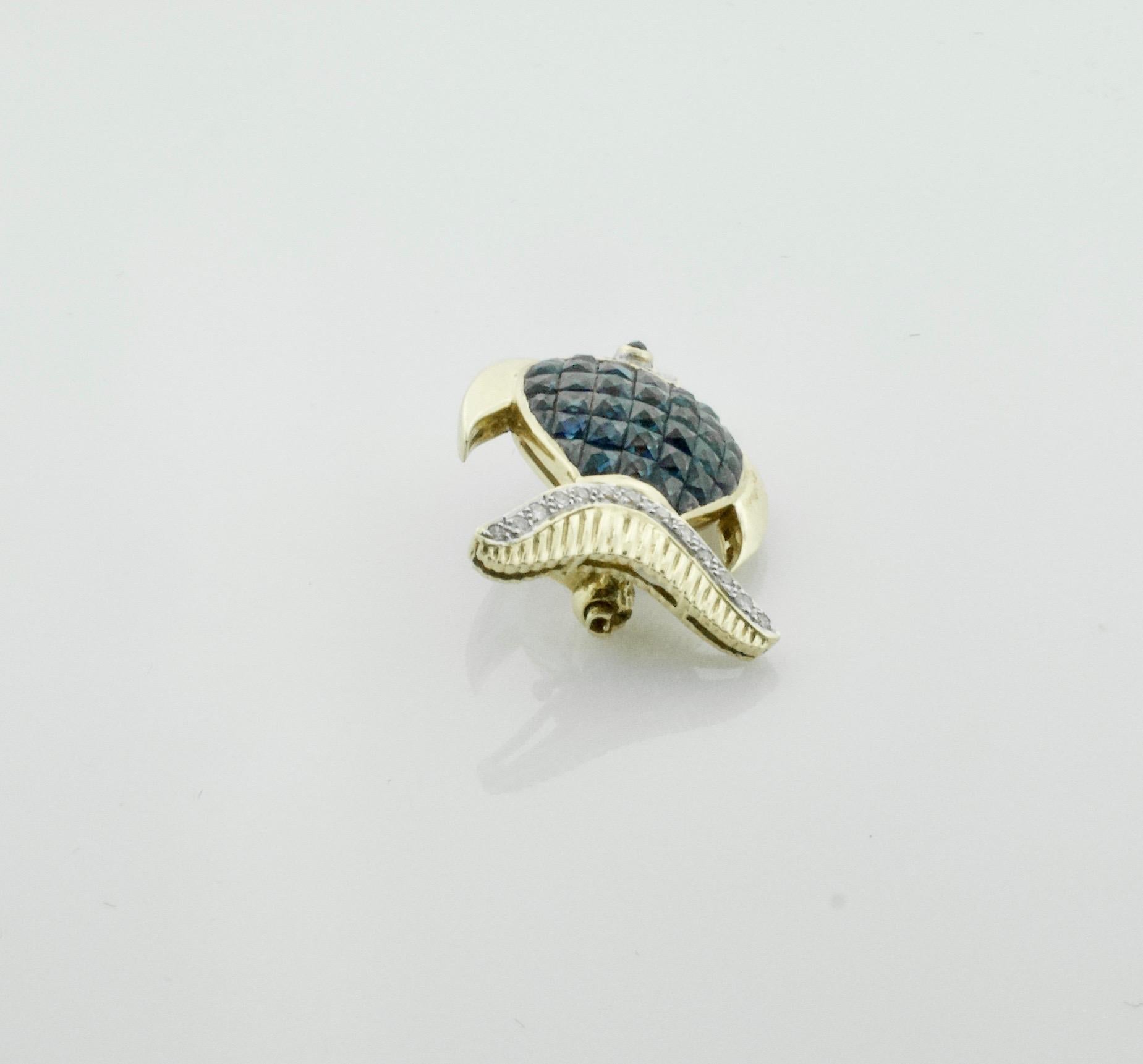 Women's or Men's Invisibly Set Sapphire and Diamond Fish Brooch in 18 Karat Yellow Gold For Sale