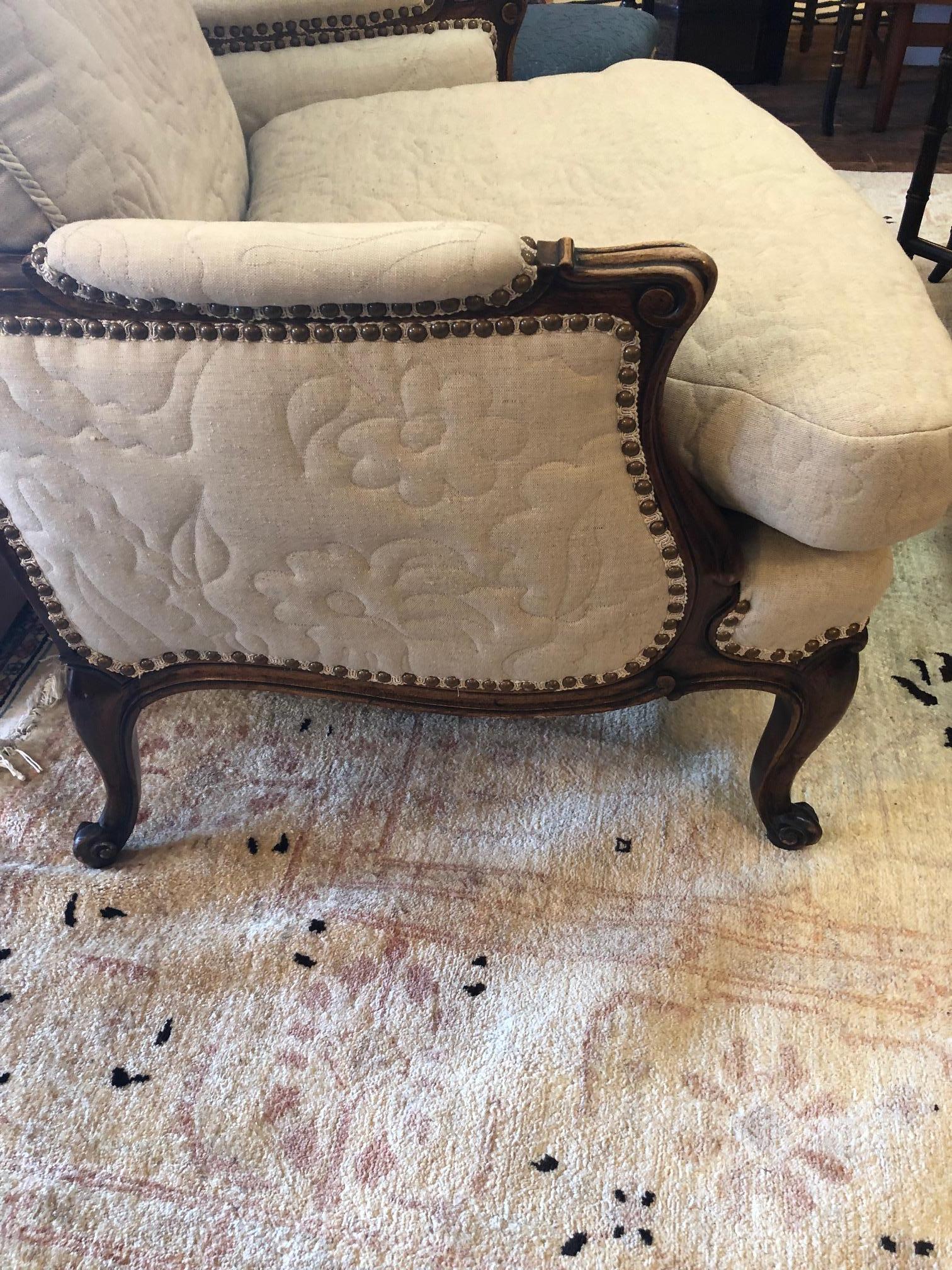 Louis XV Inviting Carved Walnut Large French Style Club Chair with Quilted Upholstery