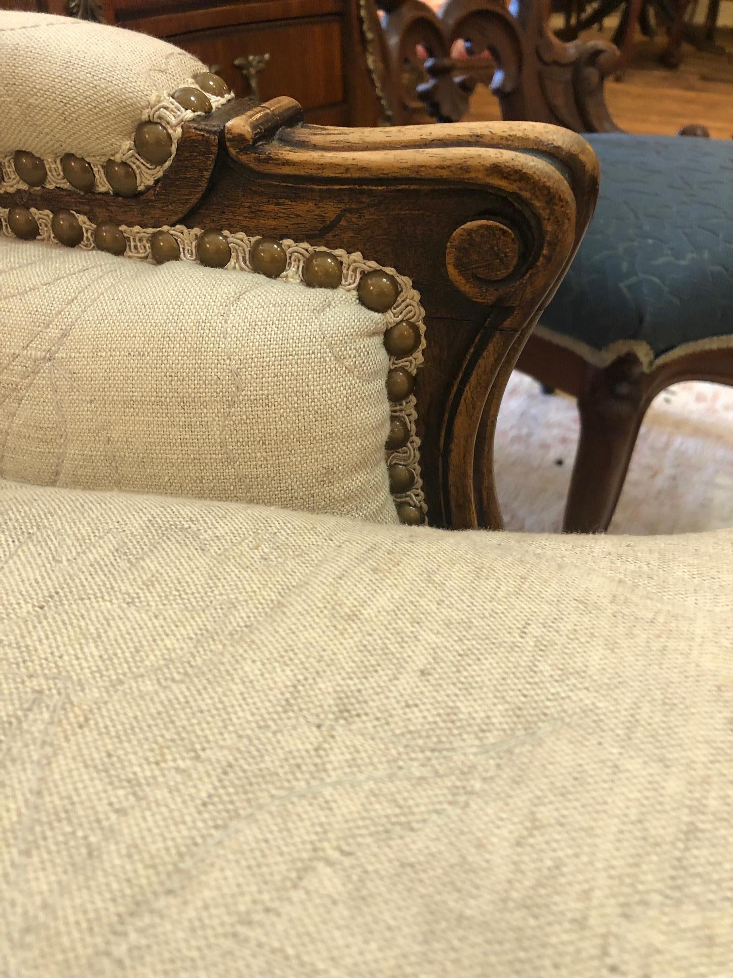 Late 20th Century Inviting Carved Walnut Large French Style Club Chair with Quilted Upholstery