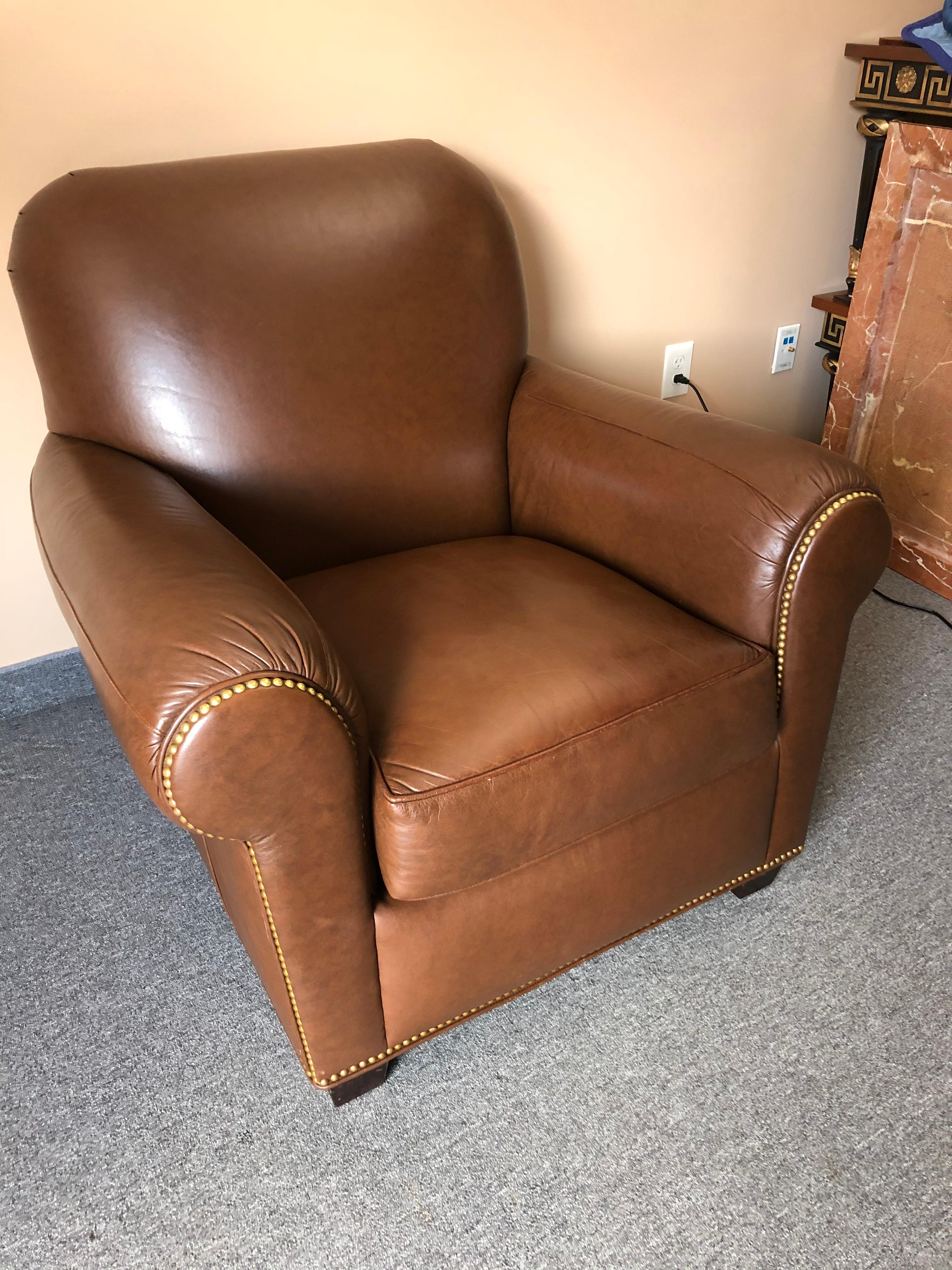 A big roomy and comfortable Classic leather club chair.
Measures: Seat depth 22
Arm height 25.

  