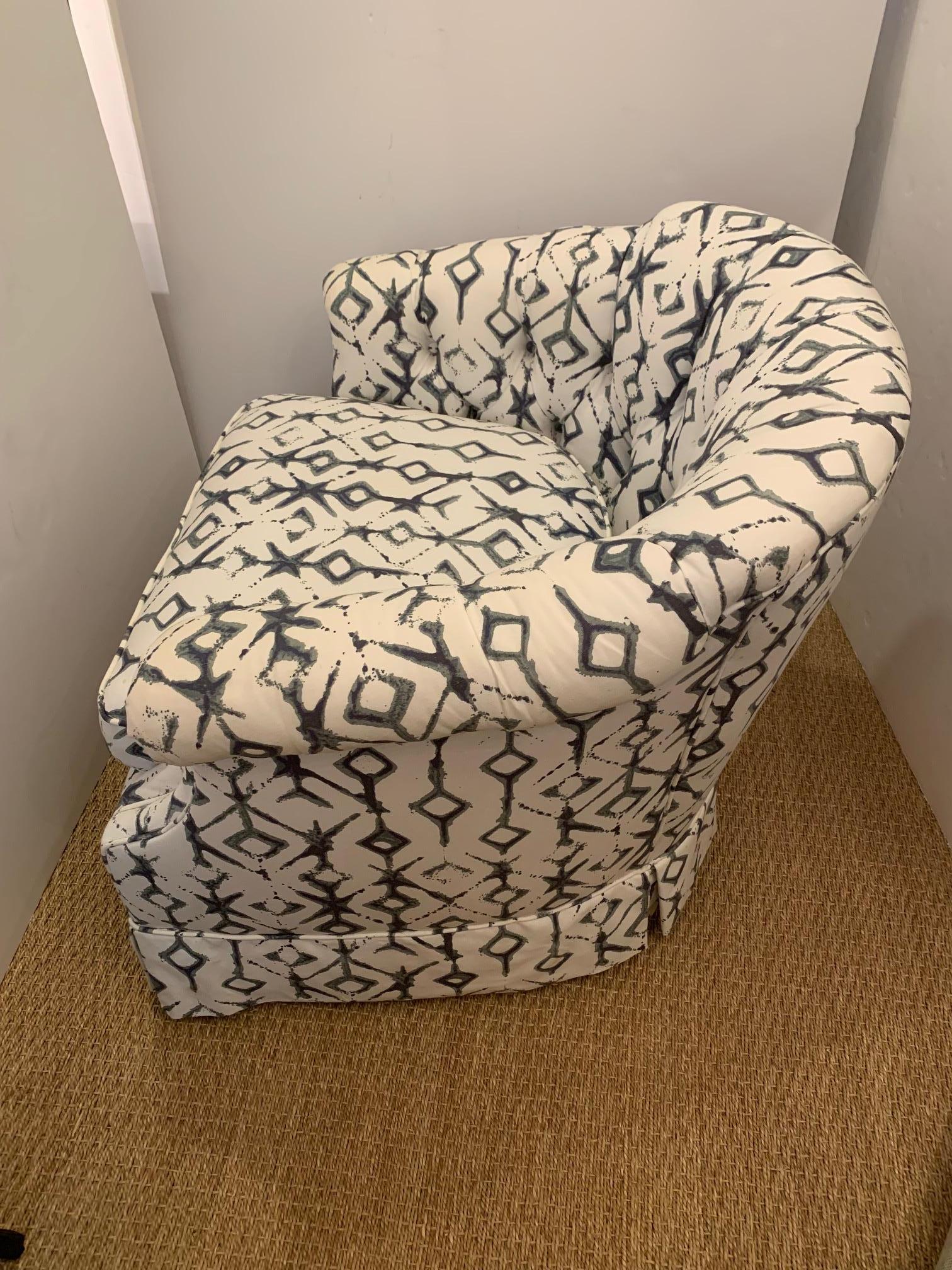Inviting comfy swivel upholstered club chair having a contemporary ikat inspired design and button tufted interior back. Looks stylish from every angle.
Measures: Seat height 17 D 21
Arm height 23.
