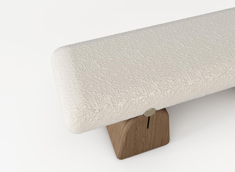 IO Bench
Hand-sculpted solid wood legs, Bouclé fabric and Patinated brass.

Designed by Buket Hoscan Bazman