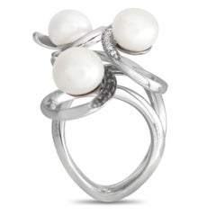 Io Si 18k White Gold 0.31 Carat Black and White Diamond and Pearl Spiral Ring