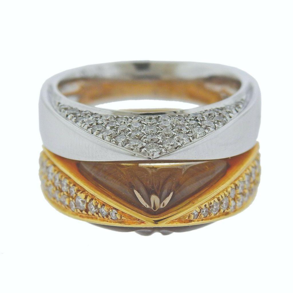 18k two tone gold Io Si double ring, with carved quartz and approx. 1.20ctw in GH/VS diamonds. Ring size 6.75. Ring is 10.5mm at widest point. Total weight 17.5 grams. Marked Io Si, 750, Italian mark.