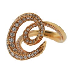 Io Si Gold Diamond Swirl Ring