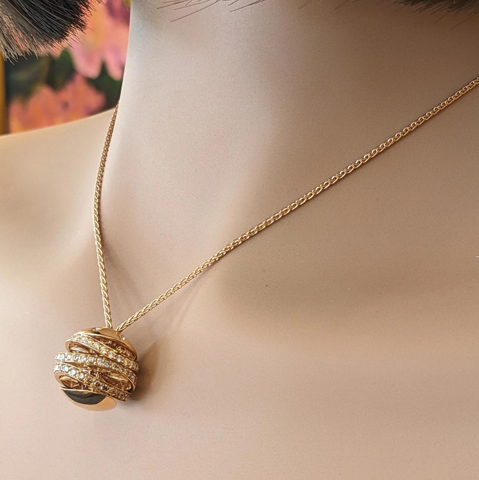 Collana con pendente a cascata in oro rosa 18 carati di You Si Italy

La collana con ciondolo Diamond Bauble è caratterizzata da diamanti tondi Brillianti naturali bianchi e marroni incastonati in nastri e in cima a un pendente mobile in oro rosa