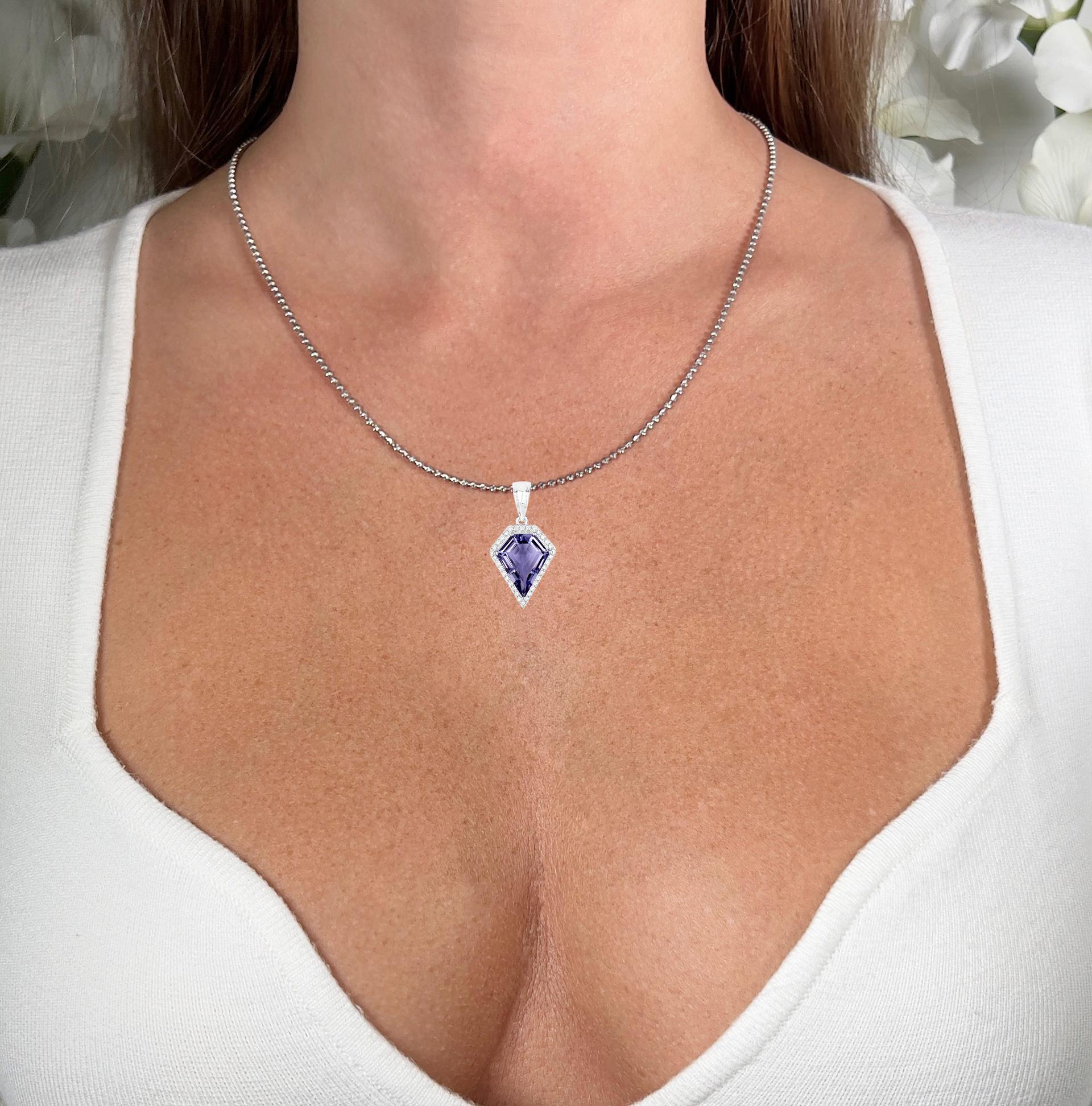 It comes with the Gemological Appraisal by GIA GG/AJP
All Gemstones are Natural
Iolite = 4.38 Carat
34 Diamonds = 0.27 Carats
Metal: 14K White Gold
Pendant Dimensions: 30 x 15 mm