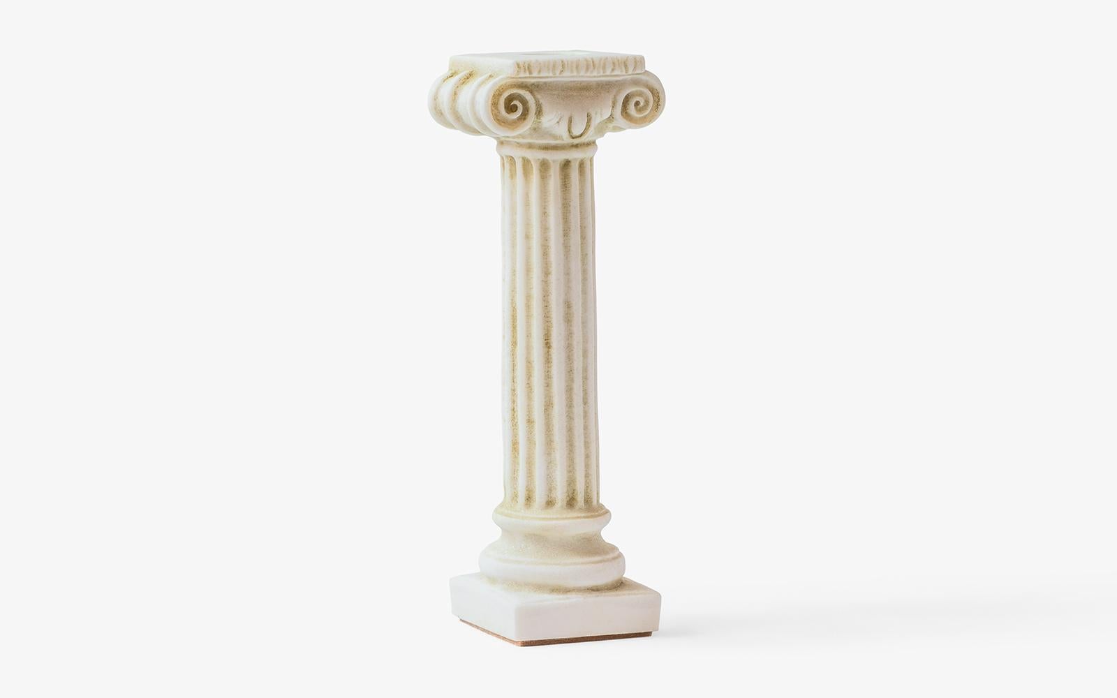 Weight: 700 gr

Ionic regular columns, born on the western and southern coasts of Anatolia, have a thin, long and elegant form.

This Ionic column candlestick is a unique and elegant decorative item that is made from compressed marble powder. It is