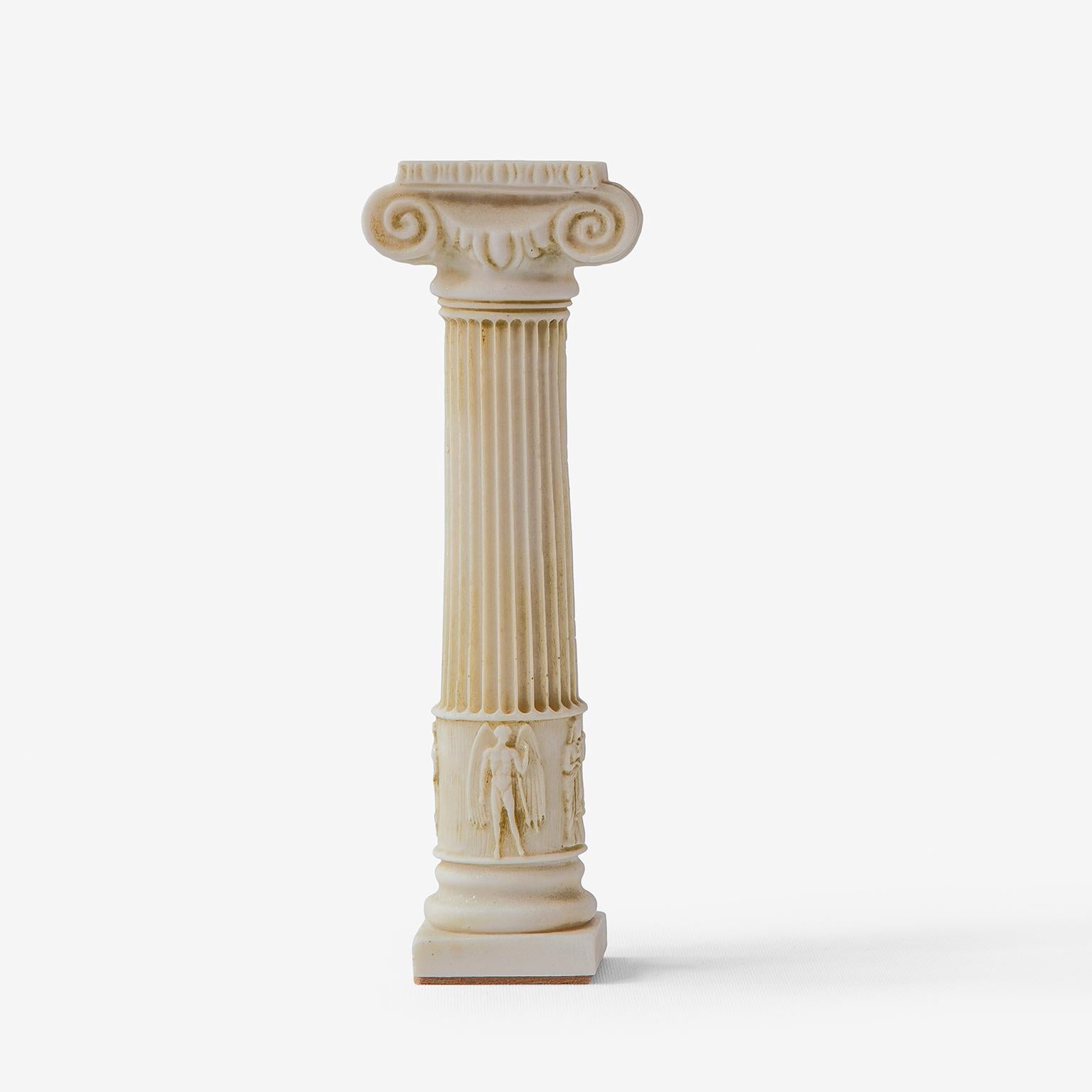 Weight: 700 gr

This candlestick is a decorative item that resembles the thin, long and elegant form of Ionic regular columns found on the western and southern coasts of Anatolia. It is made from compressed marble powder and is produced using the