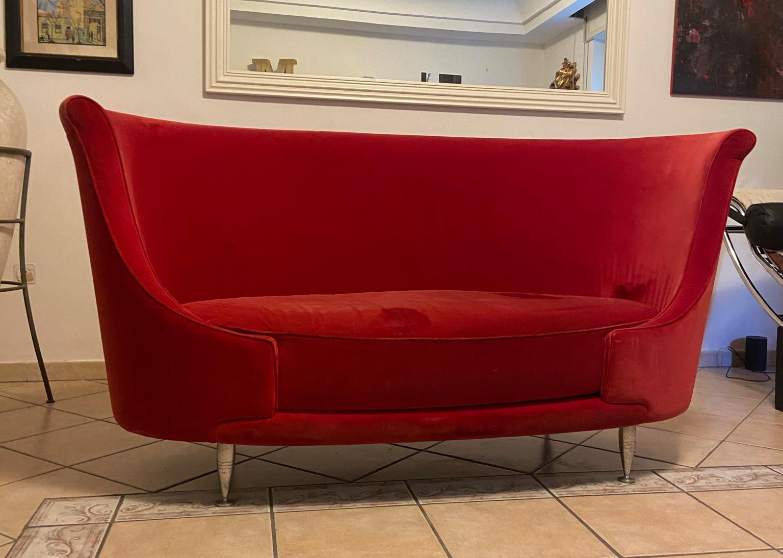 Elegant 2-seat new tone sofa.
Designed by Massimo Iosa Ghini for Moroso.
Made in Italy.
1980s production.
Two-seat sofa with an oval shape made of differentiated density polyurethane foam and polyester fiber with internal wooden structure. Feet