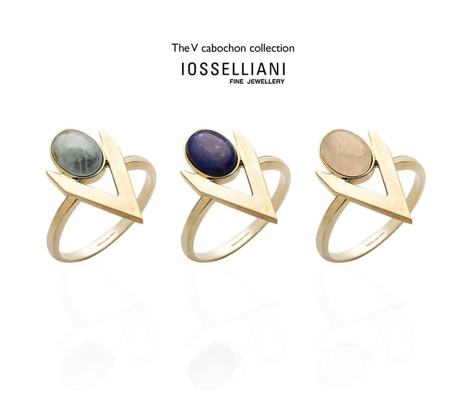 Add jewellery with a modern, feminine attitude to your outfit with this 9 Karat gold ring from Iosselliani.  Crafted in Italy in 9 Karat gold, the ring features a lapis lazuli cabochon framed into a V shape. Stone size 8x6 mm. Central height: 1,8