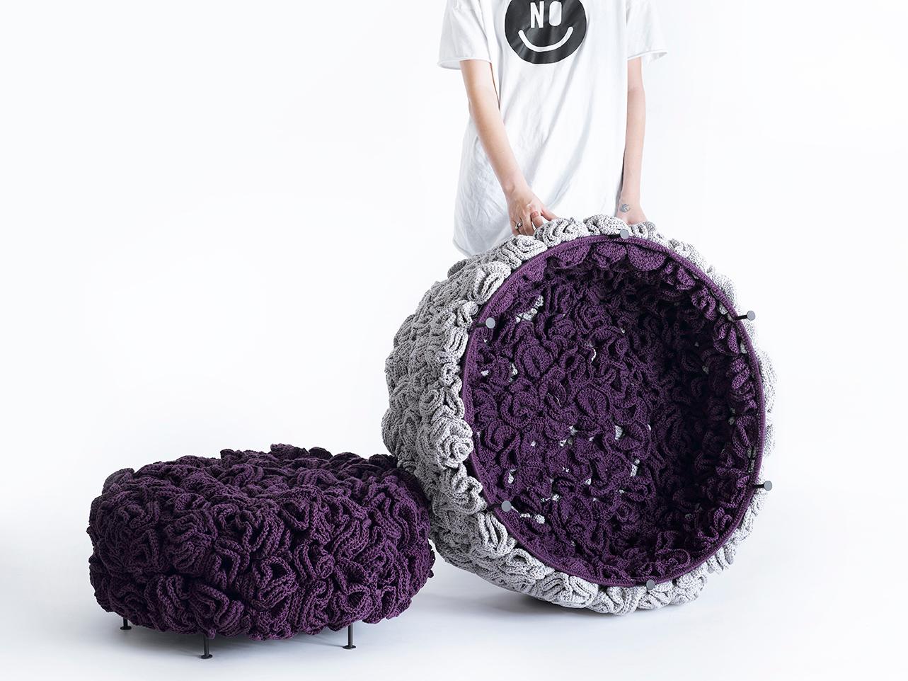 The Elements Pouf creates harmony in various spaces: living rooms, bedrooms and walk in closets.

On top of sturdy black iron structure, the textile cover of the pouf is elegant, composed of dozens of hand knit flower-like elements, made from