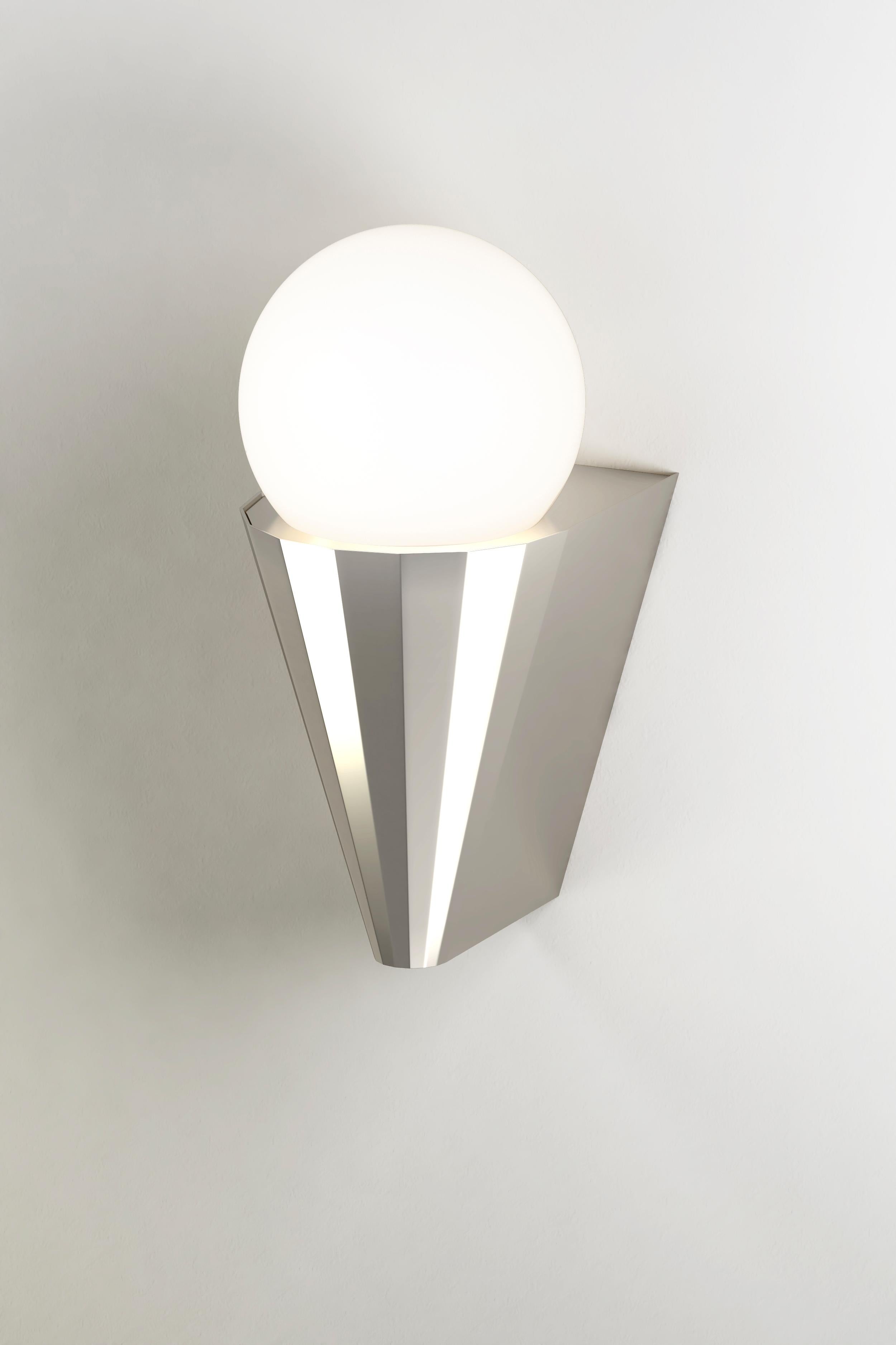 IP Cornet polished nickel wall light by Emilie Cathelineau
Dimensions: D10 x W12.5 X H21.2 cm
Materials: solid brass, polished nickel
Others finishes are available.

All our lamps can be wired according to each country. If sold to the USA it