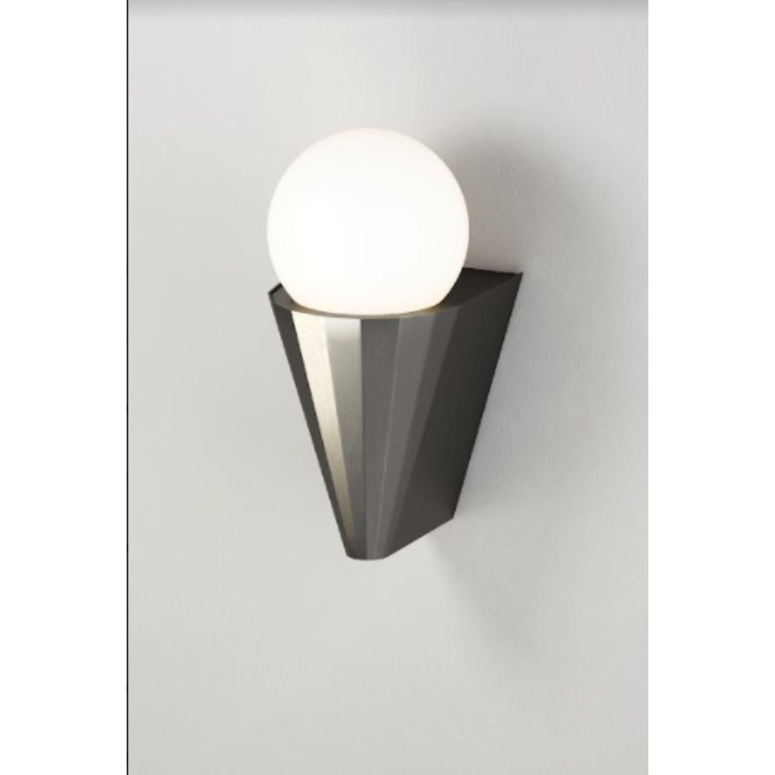 IP cornet satin graphite wall light by Emilie Cathelineau
Dimensions: D10 x W12.5 X H21.2 cm
Materials: solid brass, satin graphite
Others finishes are available.

All our lamps can be wired according to each country. If sold to the USA it will