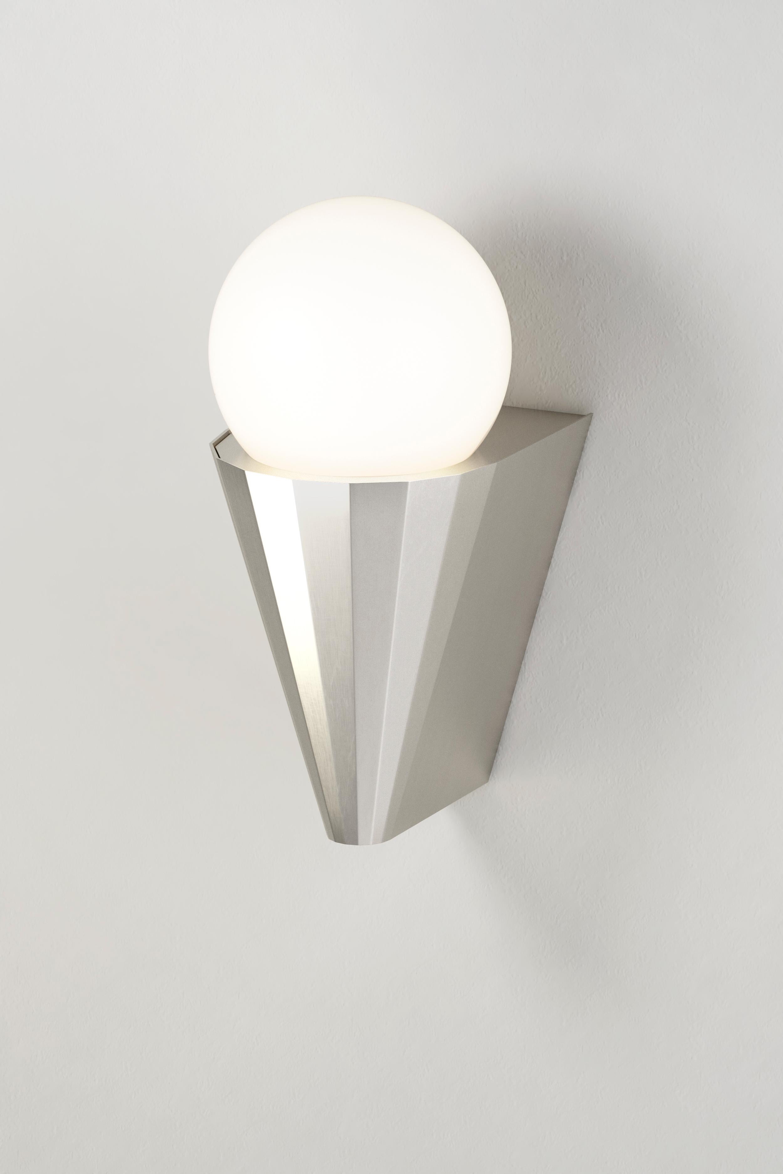 IP cornet satin nickel wall light by Emilie Cathelineau
Dimensions: D 10 x W 12.5 x H 21.2 cm
Materials: solid brass, satin nickel
Others finishes are available

All our lamps can be wired according to each country. If sold to the USA it will