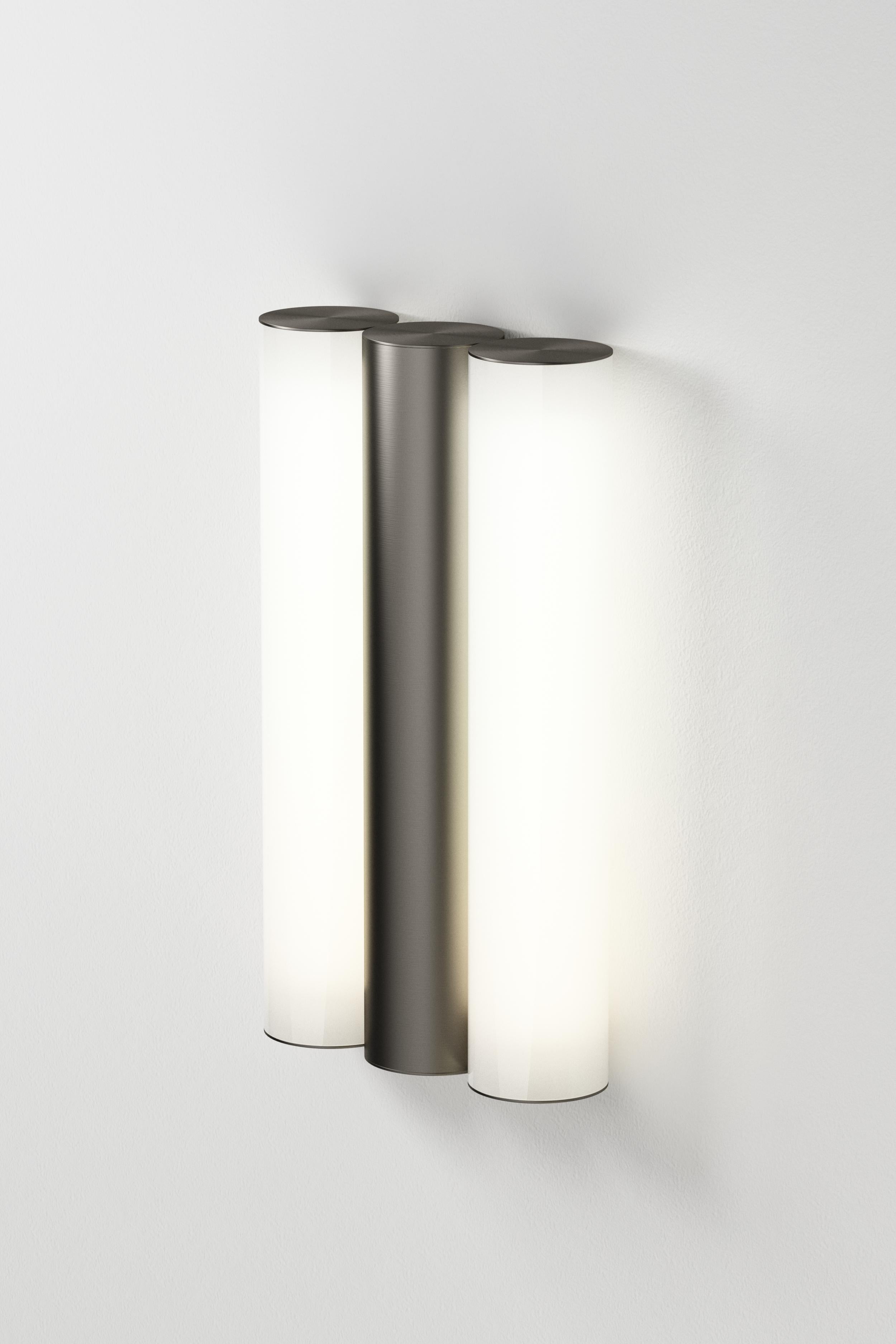 IP Gamma Satin Graphite Wall Light by Sylvain Willenz
Dimensions: D15.2 x W5 X H28.4 cm
Materials: Solid brass, Satin Graphite
Others finishes are available.

All our lamps can be wired according to each country. If sold to the USA it will be