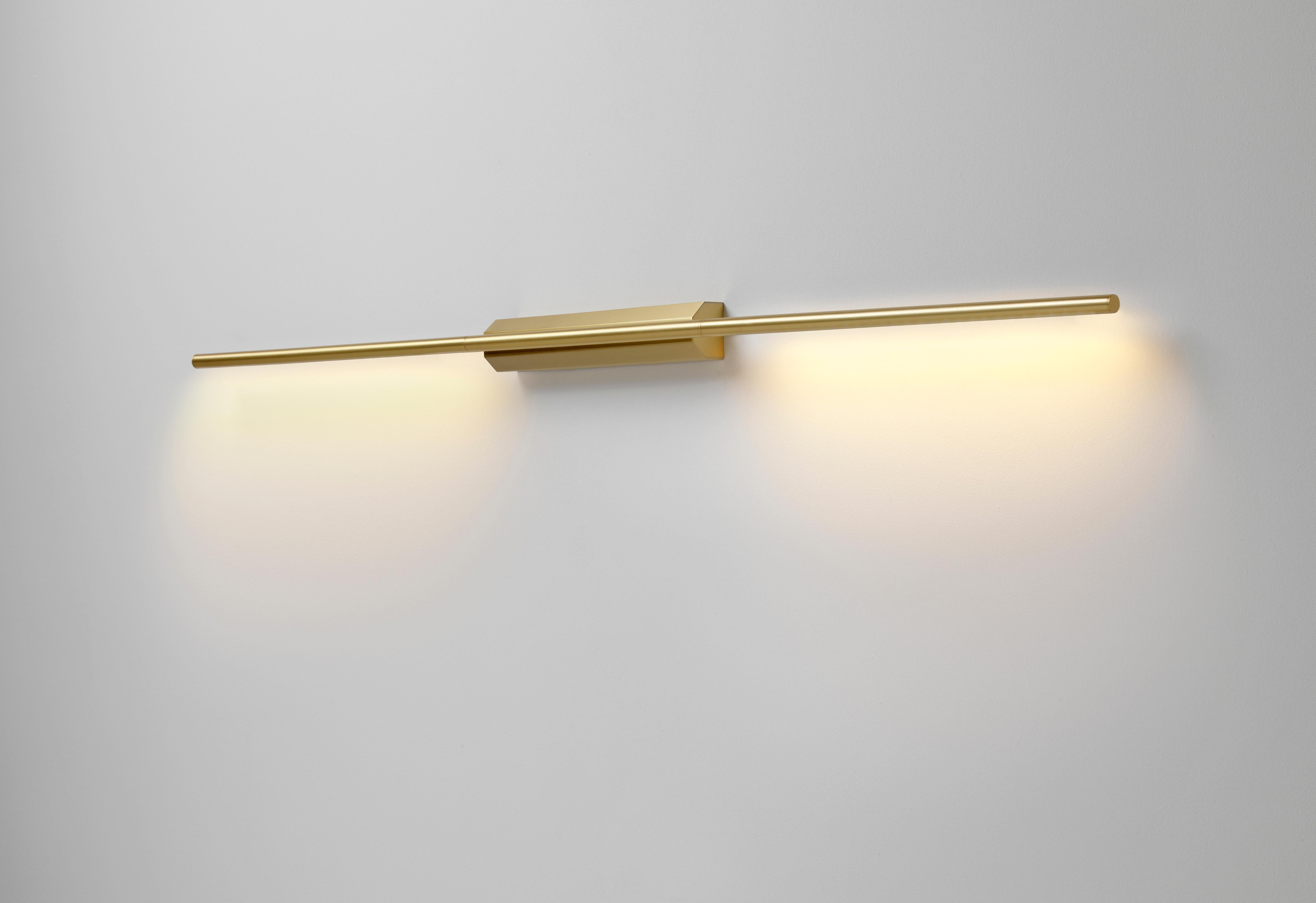 IP Link Double 1300 Satin brass wall light by Emilie Cathelineau
Dimensions: D4.5 x W5 X H1300 cm
Materials: Solid brass, Satin Brass, LED, Polycarbonate.
Others finishes and dimensions are available.

All our lamps can be wired according to