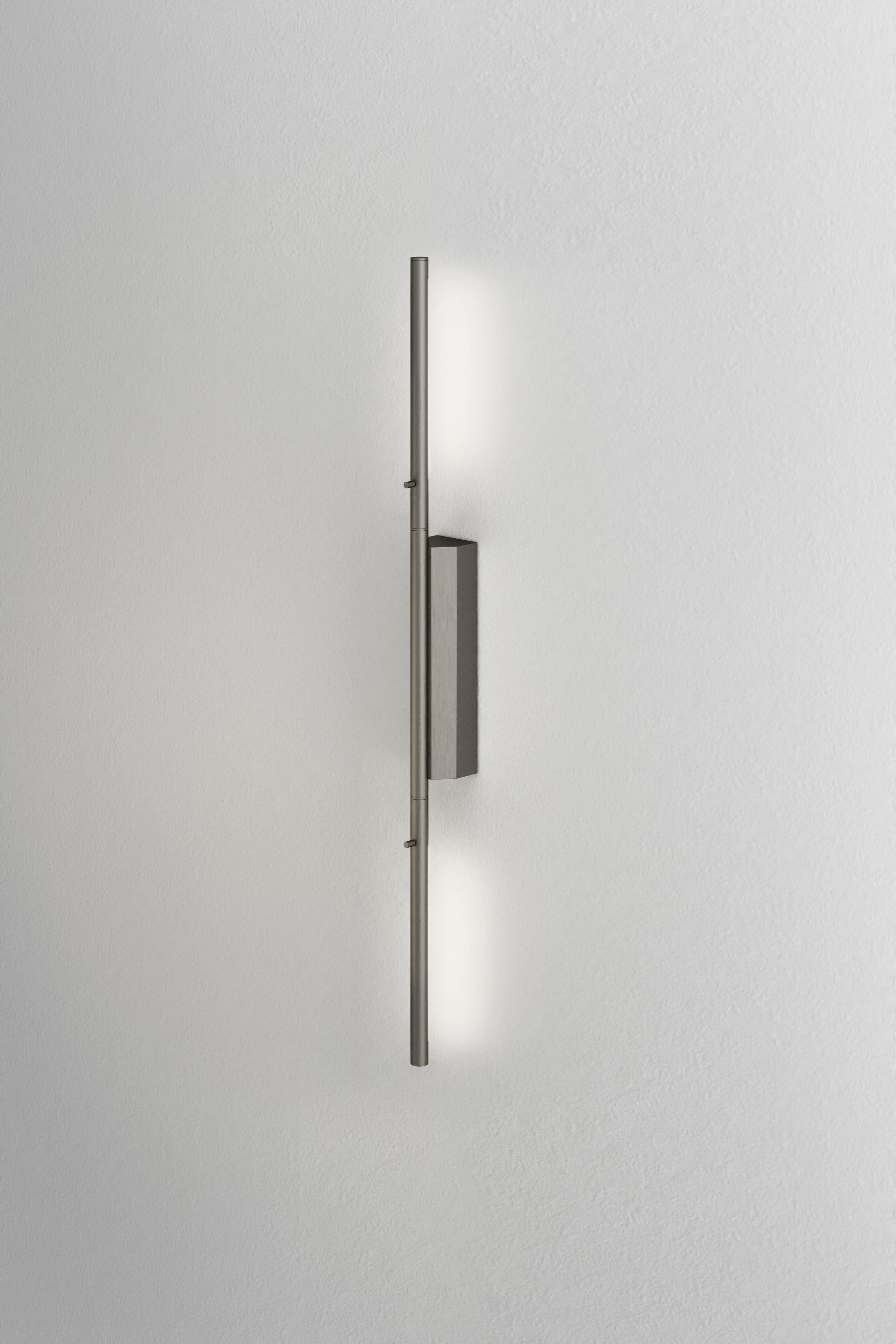 IP link double 610 Satin Graphite wall light by Emilie Cathelineau
Dimensions: D 4.5 x W 5 x H 61 cm
Materials: Solid brass, Satin Graphite, LED, Polycarbonate.
Others finishes and dimensions are available.

All our lamps can be wired according