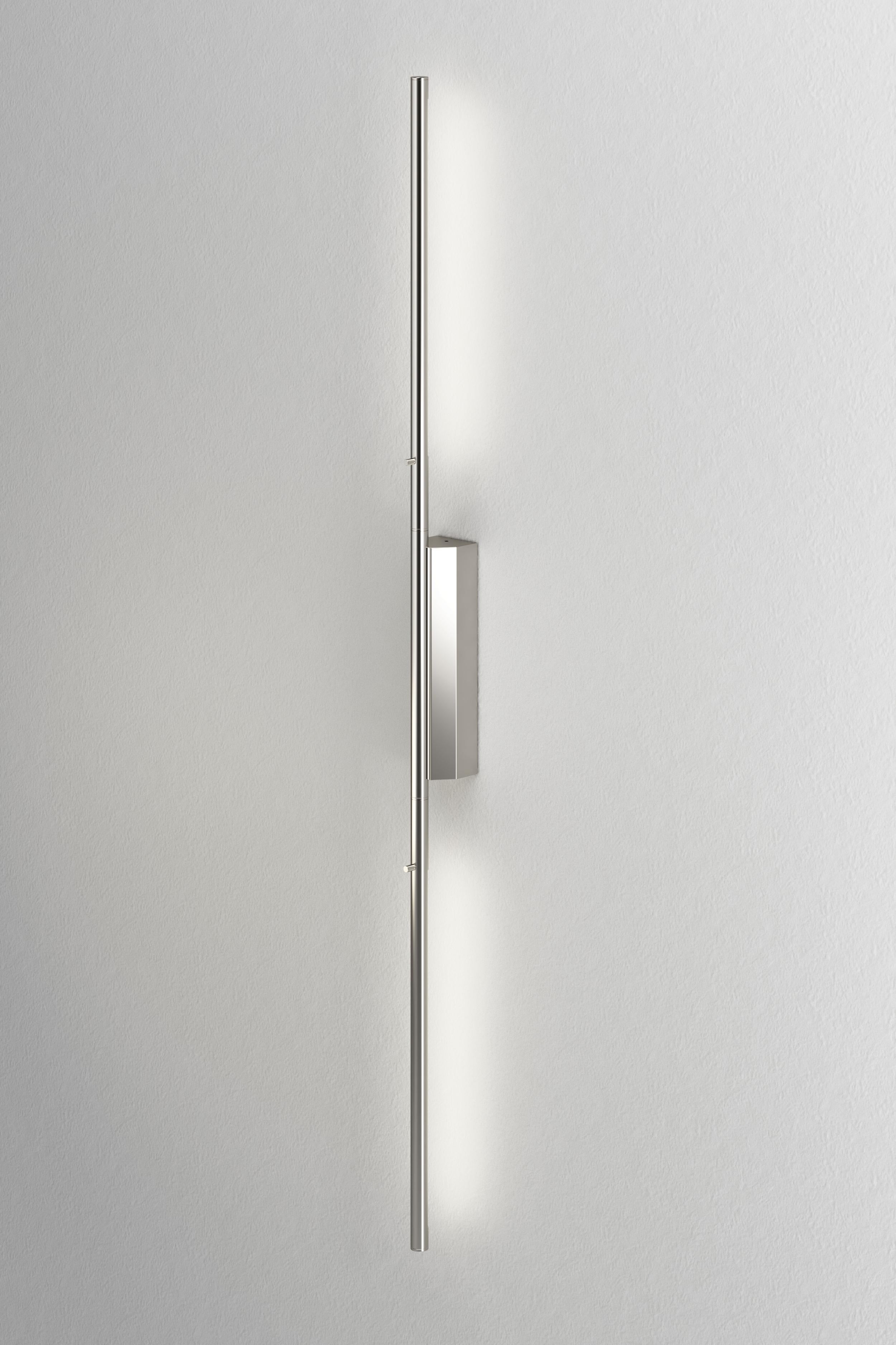 IP link double 960 polished nickel wall light by Emilie Cathelineau
Dimensions: D4.5 x W5 X H96 cm
Materials: Solid brass, polished nickel, LED, polycarbonate.
Others finishes and dimensions are available.

All our lamps can be wired according