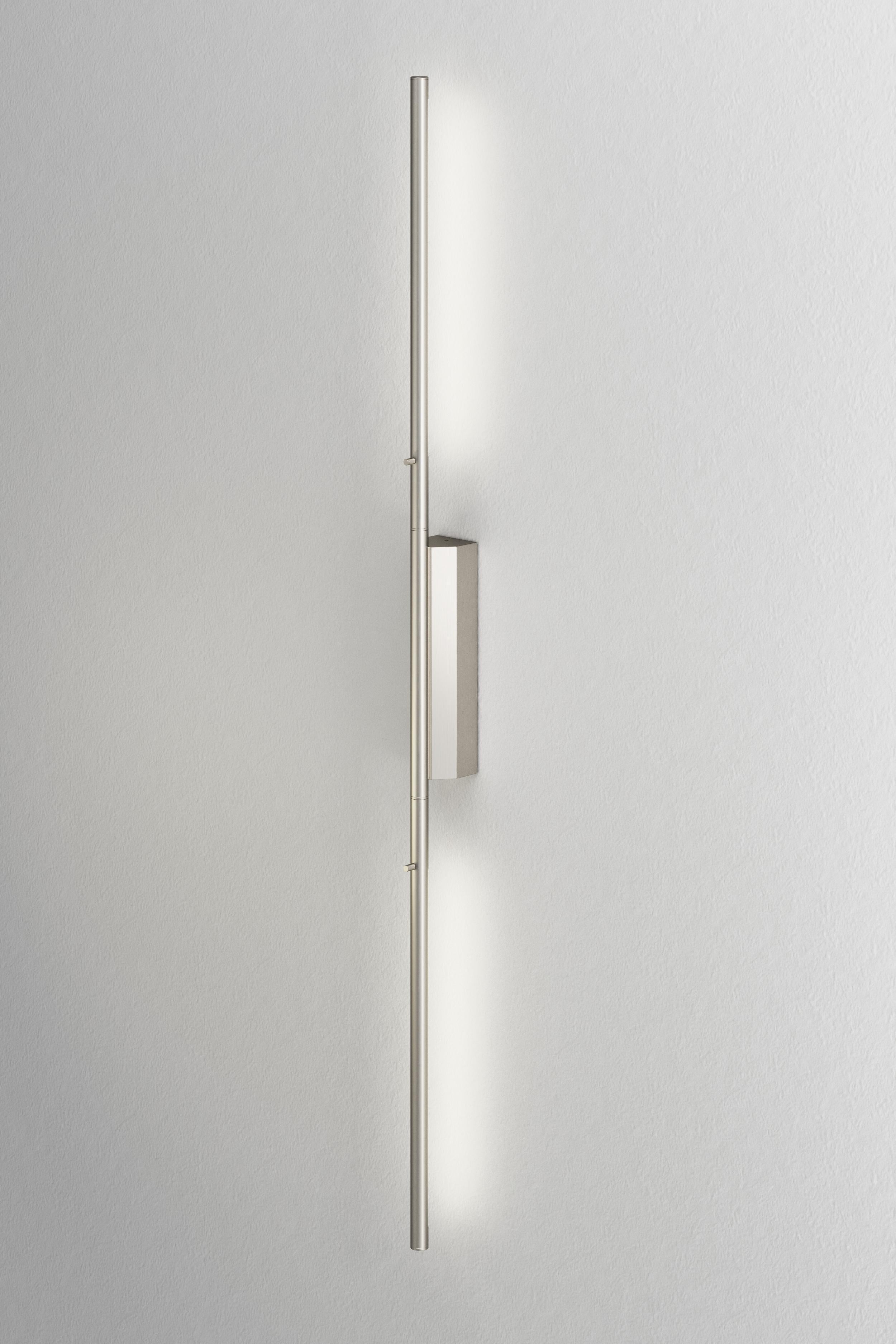 IP link double 960 satin nickel wall light by Emilie Cathelineau
Dimensions: D 4.5 x W 5 x H 96 cm
Materials: Solid brass, Satin nickel, LED, Polycarbonate.
Others finishes and dimensions are available.

All our lamps can be wired according to