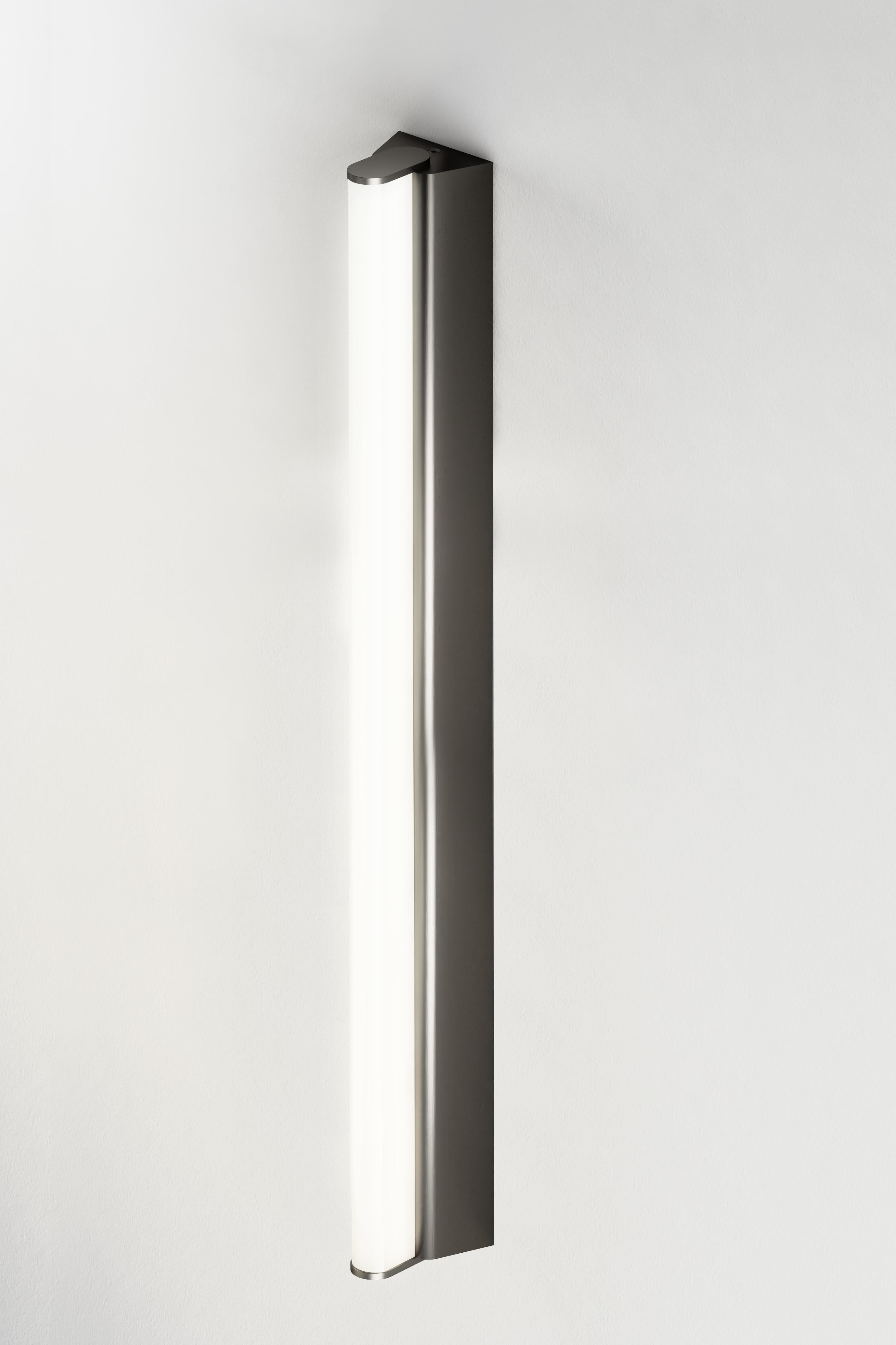 IP metrop 525 satin graphite wall light by Emilie Cathelineau
Dimensions: D52.5 x W5 X H4.5 cm
Materials: Solid brass, Satin Graphite, LED, Polycarbonate.
Others finishes and dimensions are available.

All our lamps can be wired according to