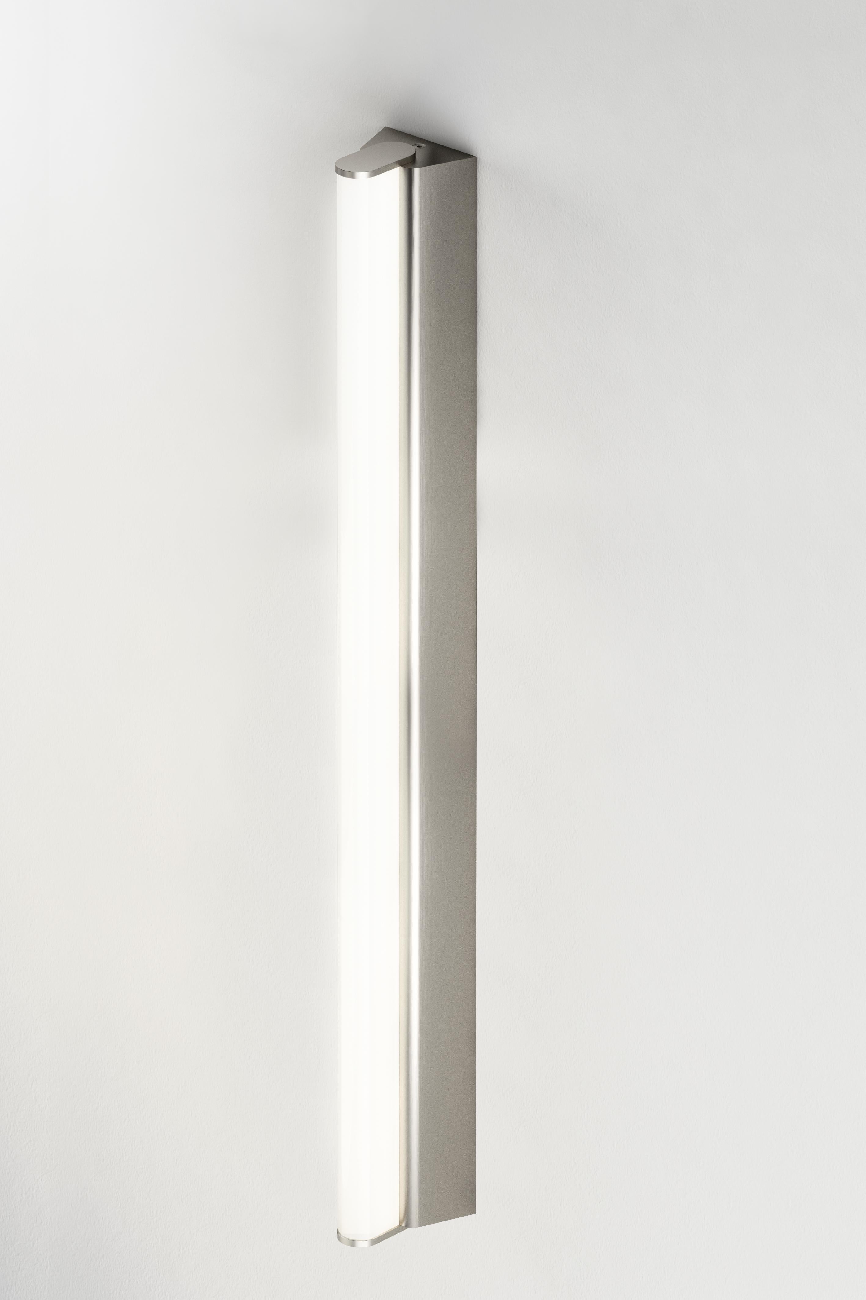 IP metrop 525 satin nickel wall light by Emilie Cathelineau
Dimensions: D52.5 x W5 X H4.5 cm
Materials: solid brass, satin nickel, LED, polycarbonate.
Others finishes and dimensions are available.

All our lamps can be wired according to each