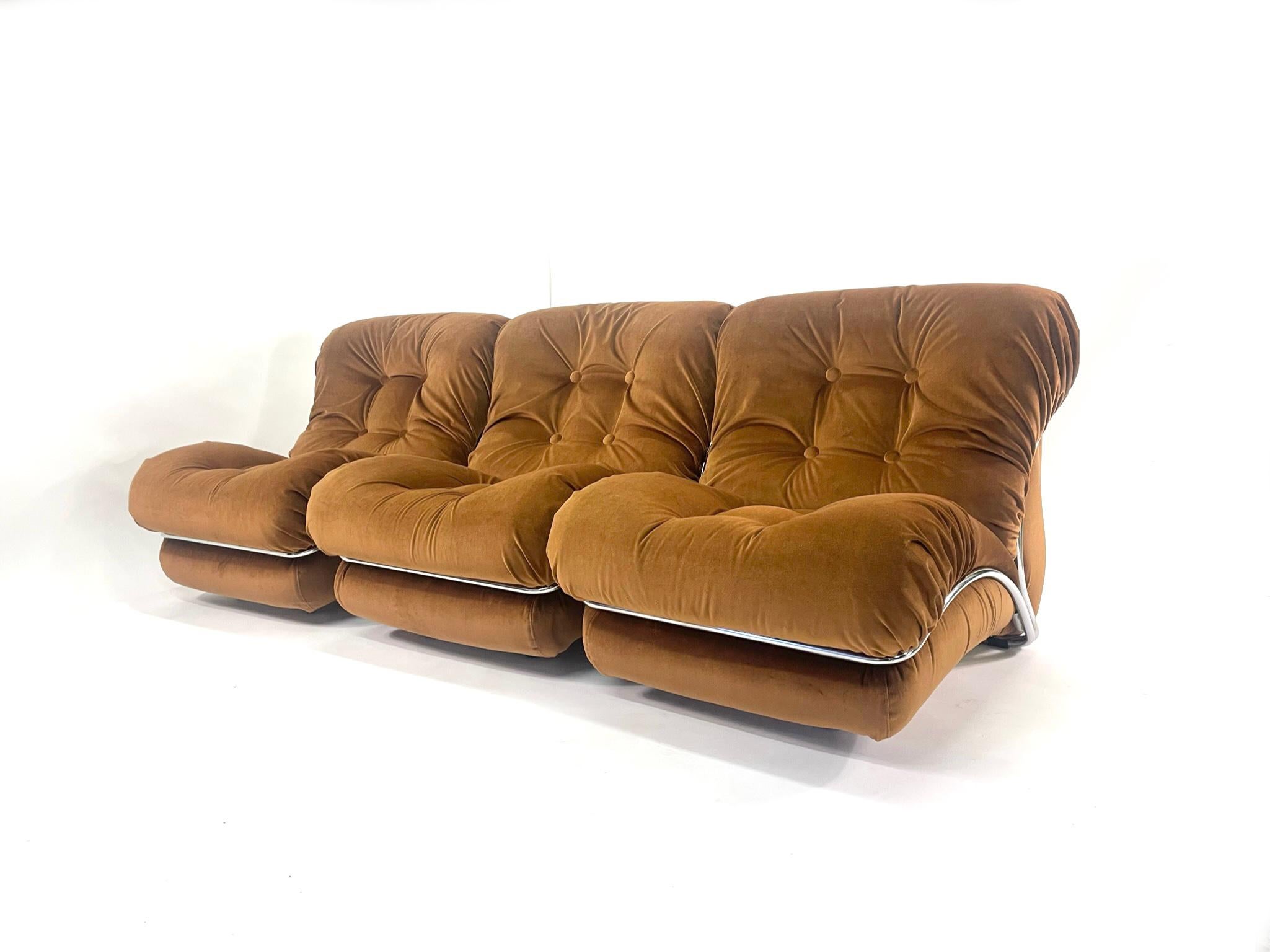 I.P.E., lounge chair, model 'Corolla', velvet, chrome-plated steel, Italy, 1970s

A striking design that will add a vibrant softness to your room.  Lower yourself into a cloud of comfort.  A wing-like structure that resembles a butterfly is used for