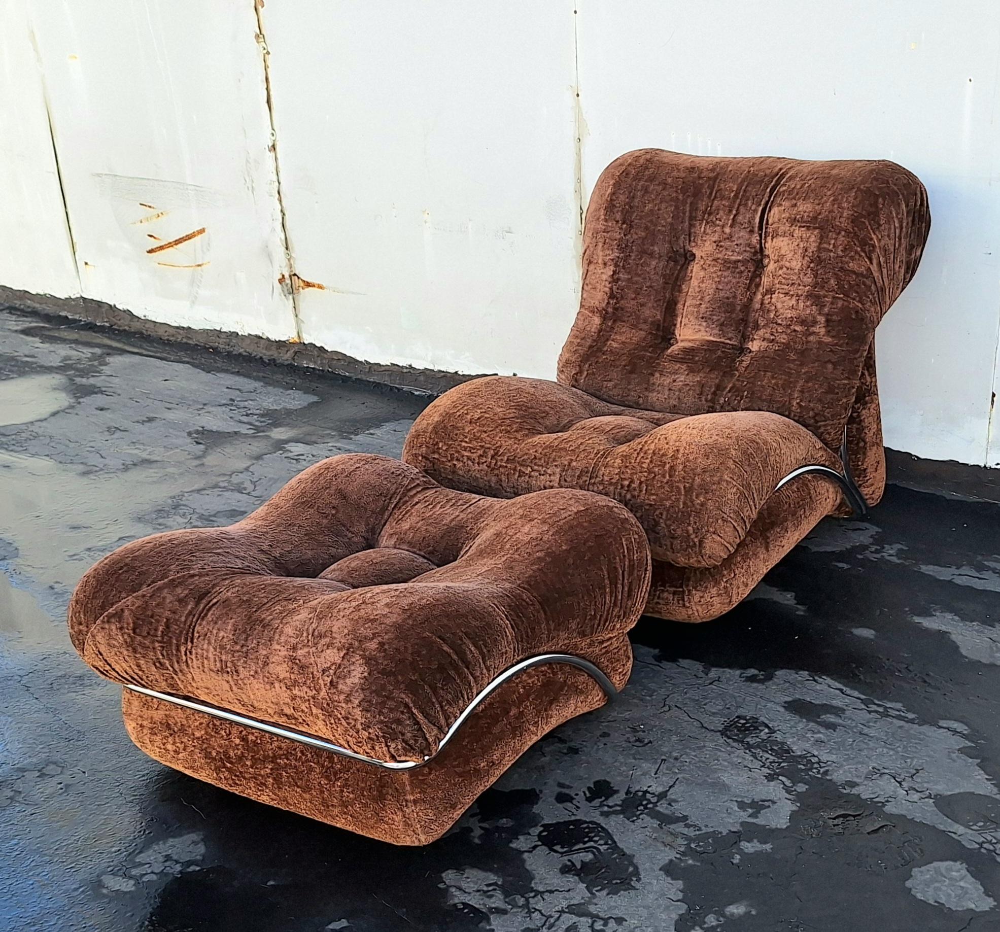 A stunning design that will add a nice addition to  your room. The chair construction of the seat is a comfort that is design for the long seating.  A tubular frame and the crash velvet  are in original condition. Ottomans dimension  is 28x28  