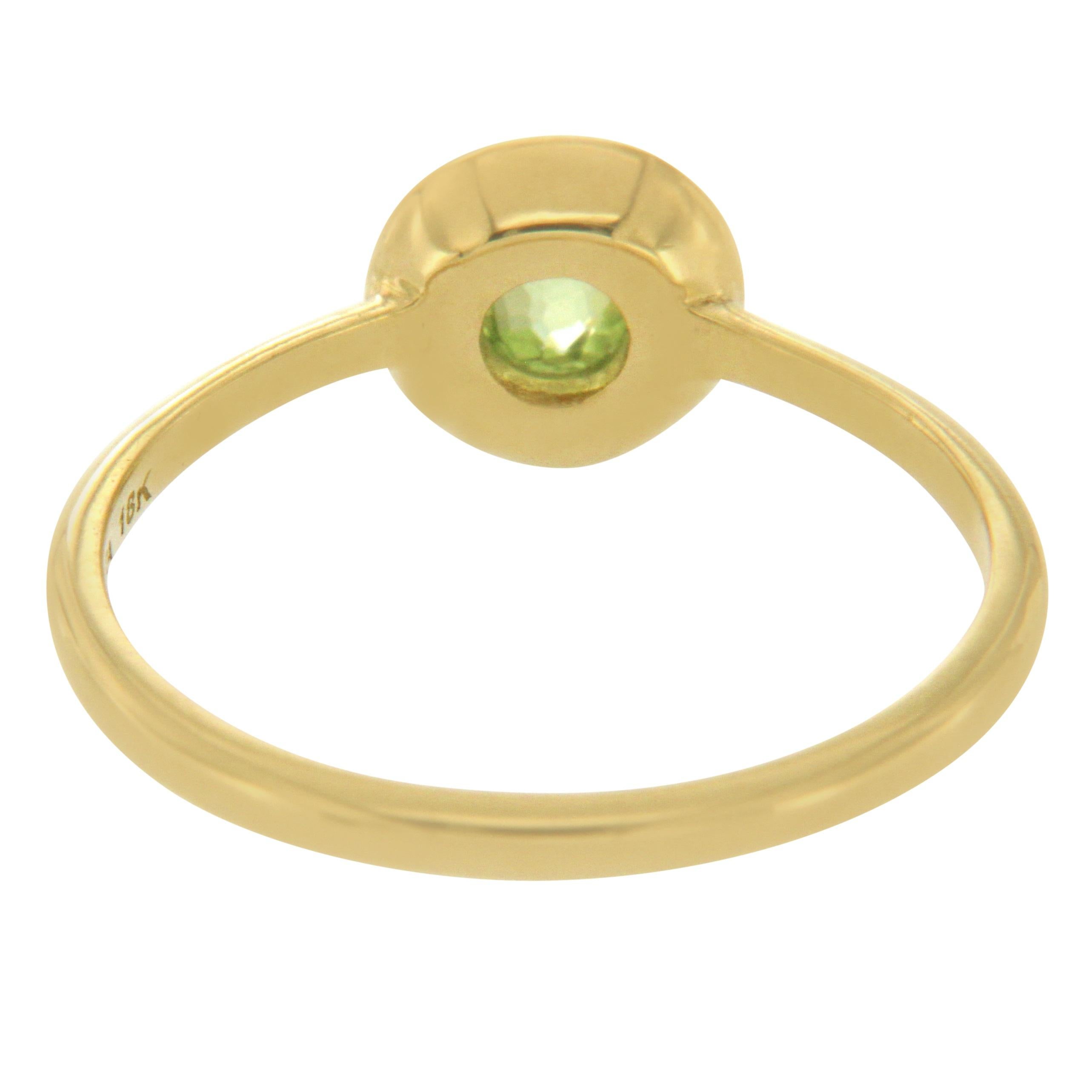 Type: Ring
Top: 7 mm
Band Width: 1.7 mm
Metal: Yellow Gold
Metal Purity: 18K.
Hallmarks: Ippolita 18K
Total Weight: 2.3 Grams
Stone Type: Diamonds & Peridot
Condition: New
Stock Number: U512
Retail Price:$895