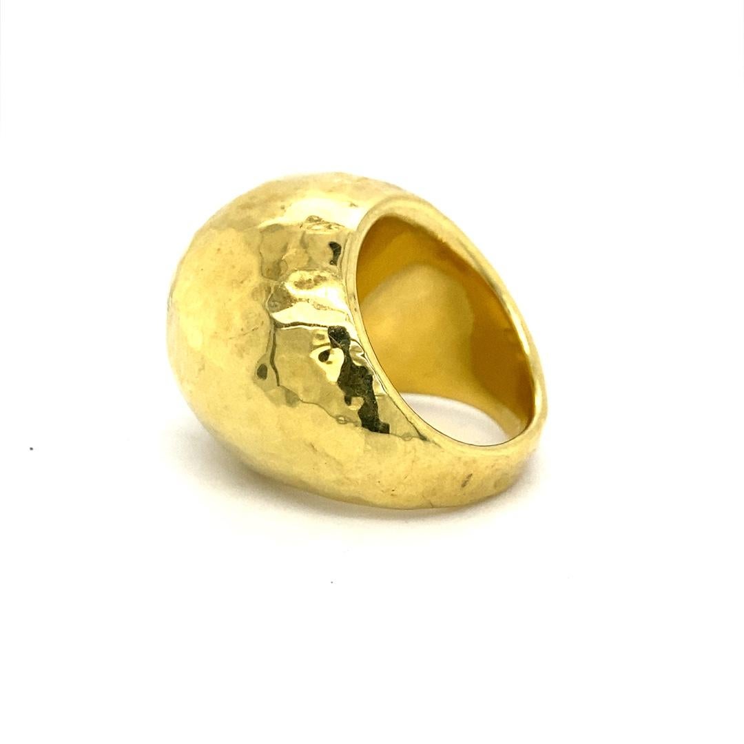 Don't miss out on this beautiful hammered dome ring. This Ippolita ring is made of 18 karat yellow gold. The ring is a size 8 and weighs 7.6g.