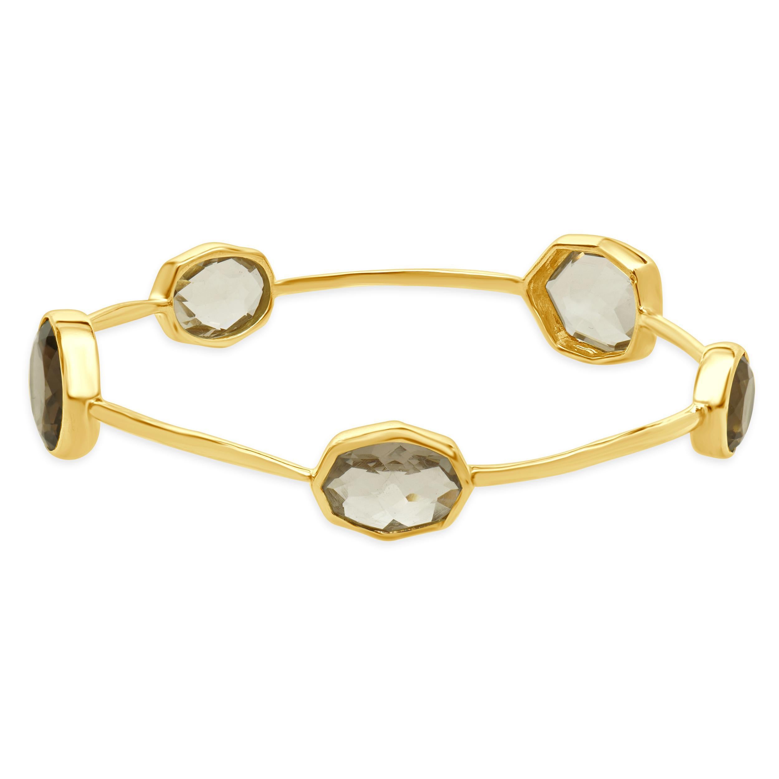 Designer : Ippolita
Matériau : Or jaune 18K
Dimensions : le bracelet convient à un poignet de 8 pouces maximum.
Poids : 20,20 grammes