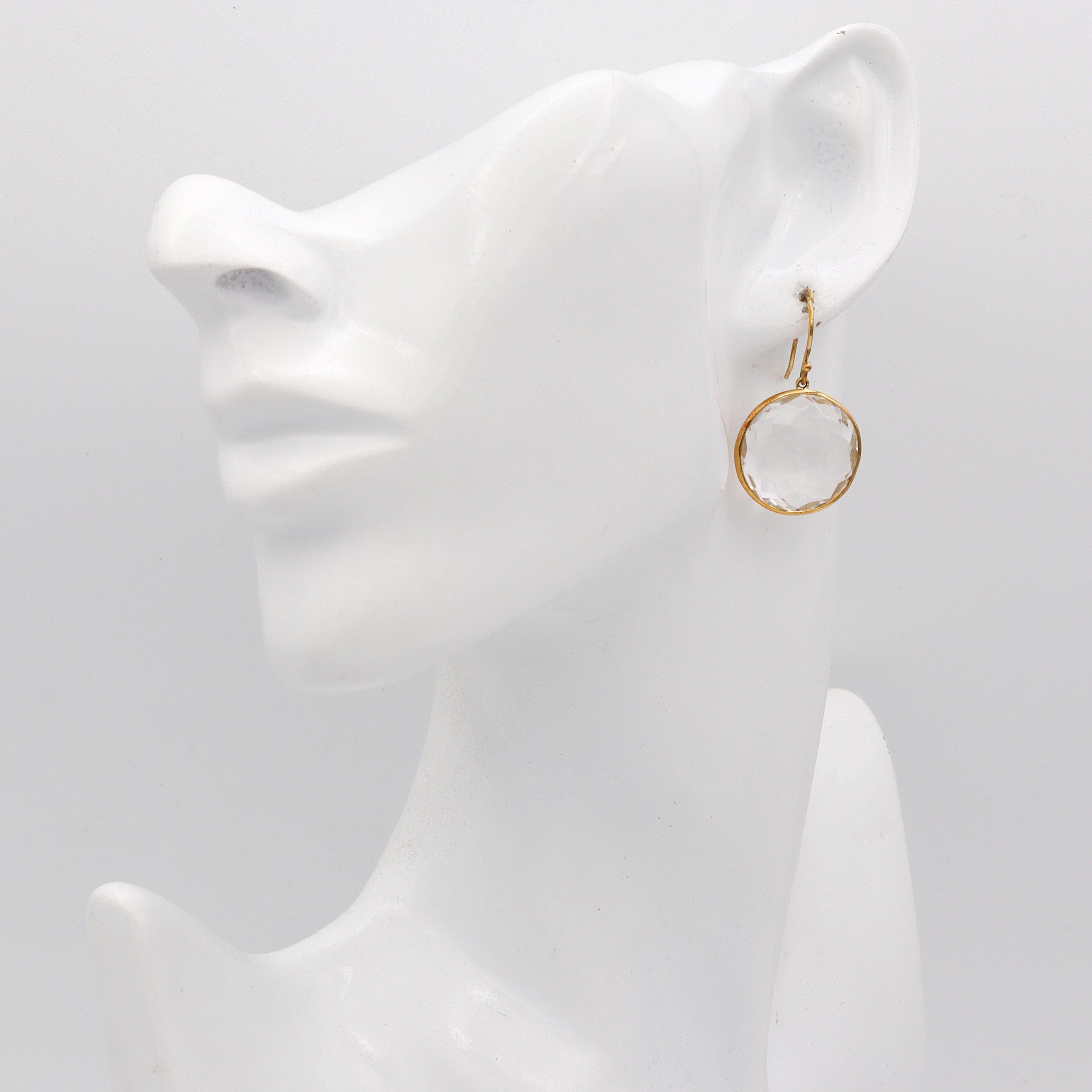 Introducing the Ippolita 18K Yellow Gold Drop Earrings, a harmonious blend of timeless elegance and modern sophistication. Each handcrafted piece showcases a faceted rock crystal, celebrated for its exceptional clarity and brilliance. The luminous