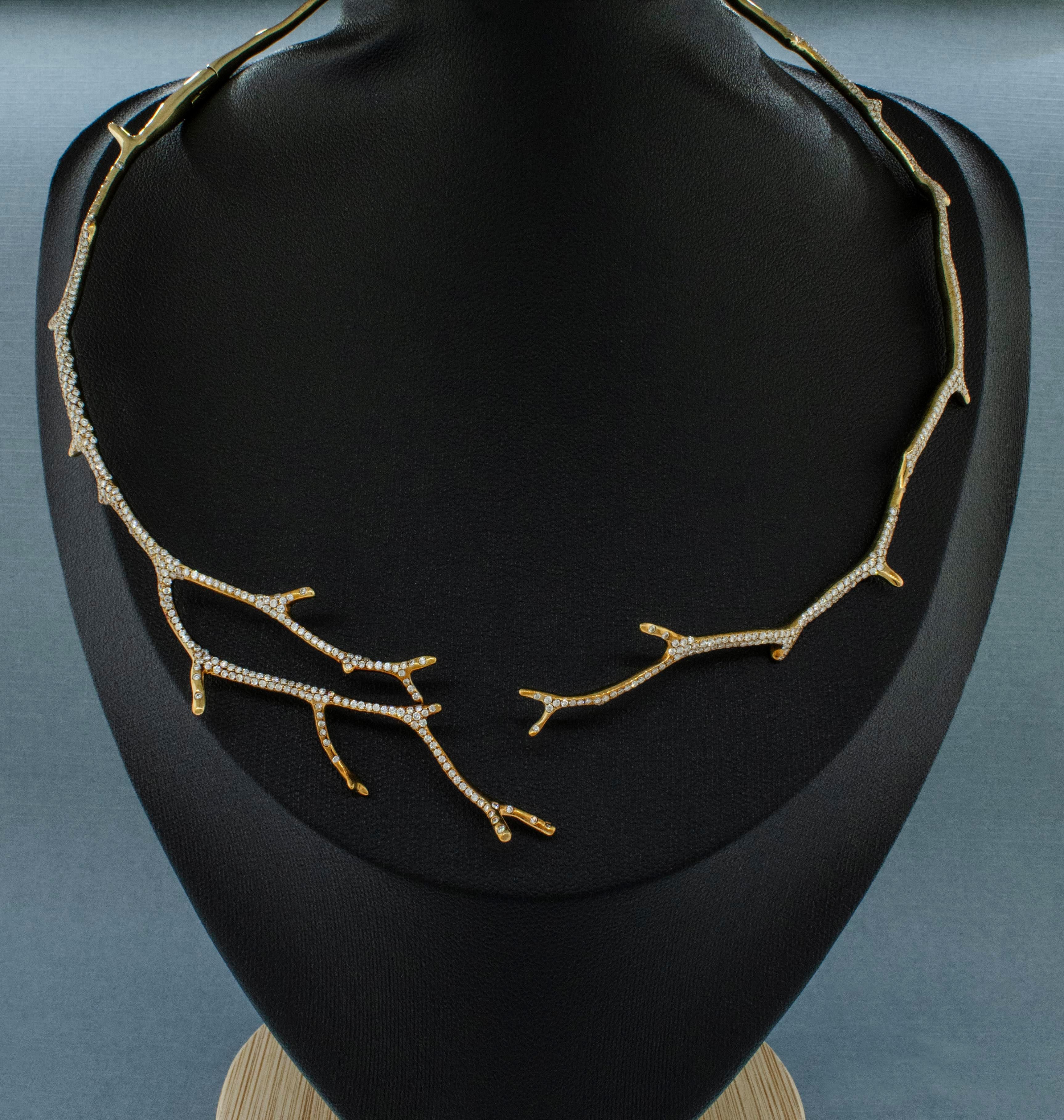 Ippolita 18K Yellow Gold Diamond Hinged Collar Necklace
Metal: 18 Karat Yellow Gold
Stones: Diamonds at 2.30 carats total weight. 

Designer Ippolita Rostagno combines her love of beauty with respect of Mother Nature. Ippolita uses 100% recycled