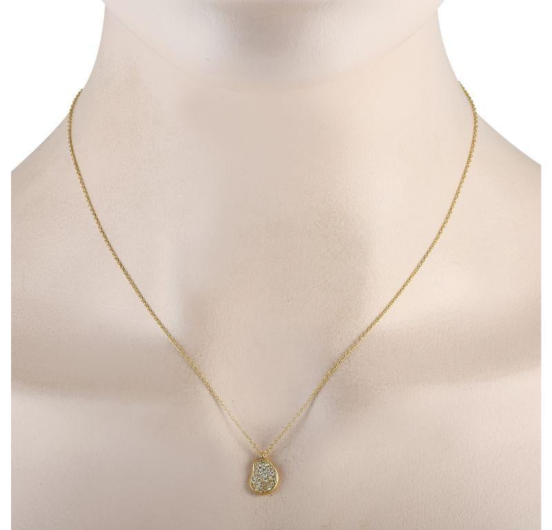 There’s something unexpectedly elegant about this simple, refined Ippolita necklace. Suspend from an 18” chain, you’ll find a gracefully curved 18K Yellow Gold pendant measuring 0.50” long and 0.40” wide. At its center, an array of sparkling