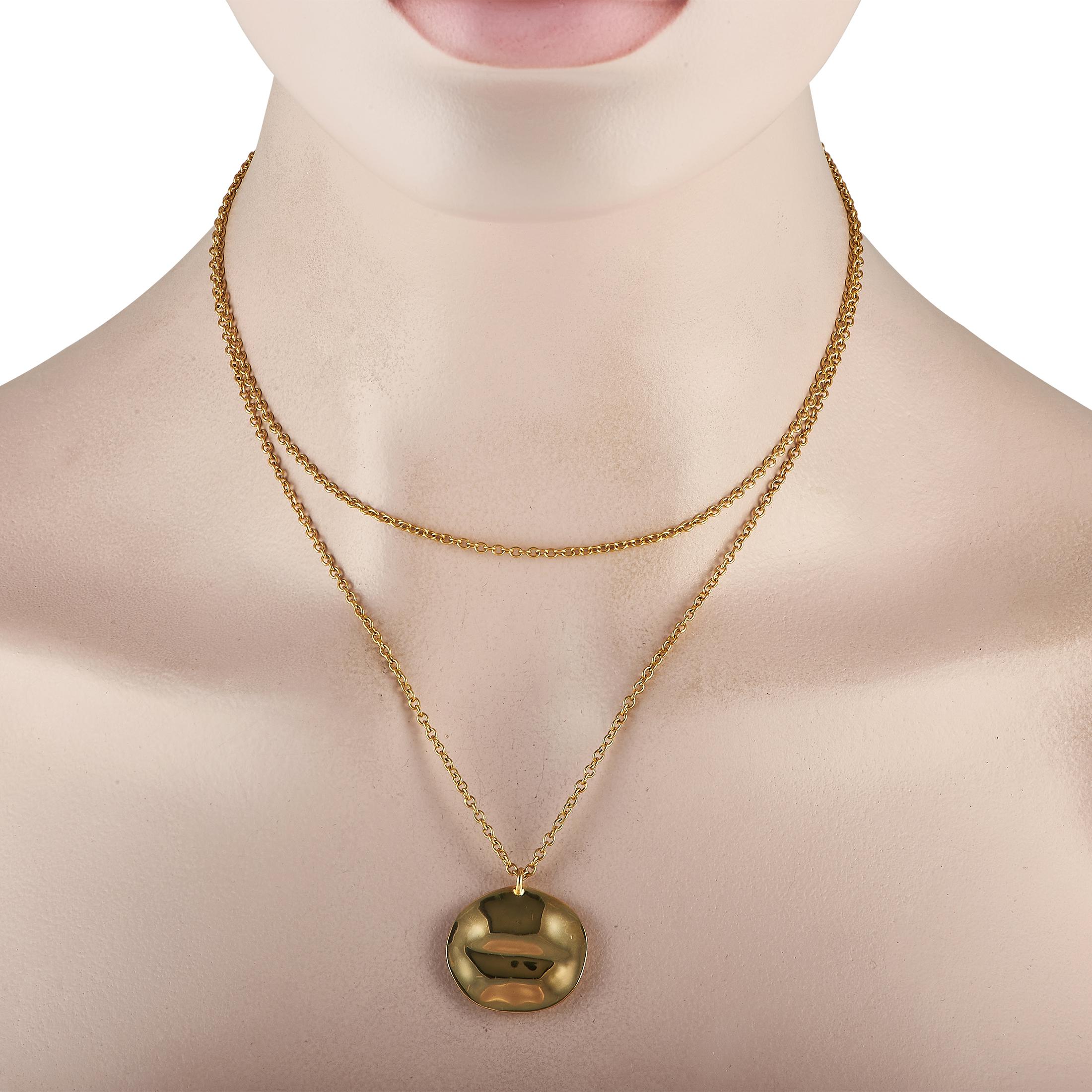 This Ippolita necklace will simply never go out of style. Suspended at the center of the 35” chain, you’ll find a textured pendant measuring 1.0” round made from lustrous 18K Yellow Gold. 
 
 This jewelry piece is offered in estate condition and