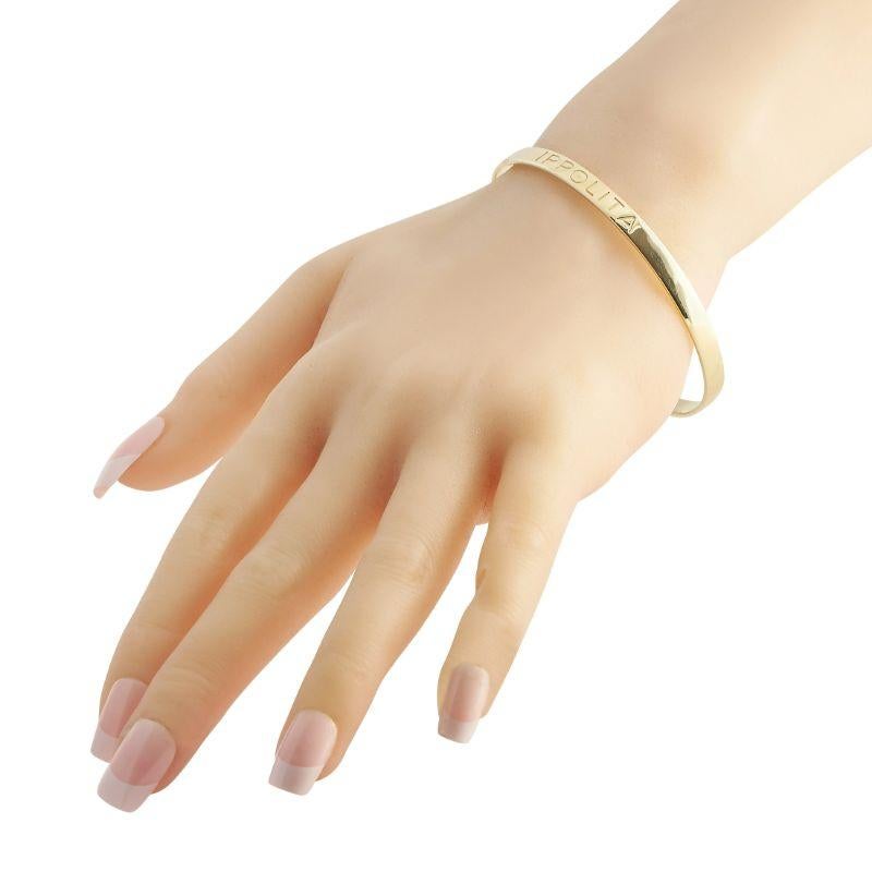 A classic flat bracelet crafted in 18K yellow gold and designed with straight edges. Wear it as it is for that hint of edgy elegance or stack it with your other bangles for a charming wrist party. The bracelet is stamped with IPPOLITA.
 
 This