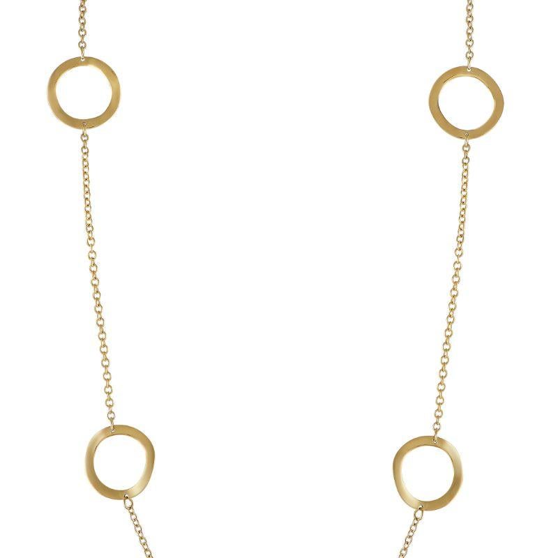 This dramatic 50” long Ippolita necklace is elegant, versatile, and incredibly wearable. A series of circular accents elevate the simple chain, which is crafted from lustrous 18K Yellow Gold. 
 
 This jewelry piece is offered in estate condition