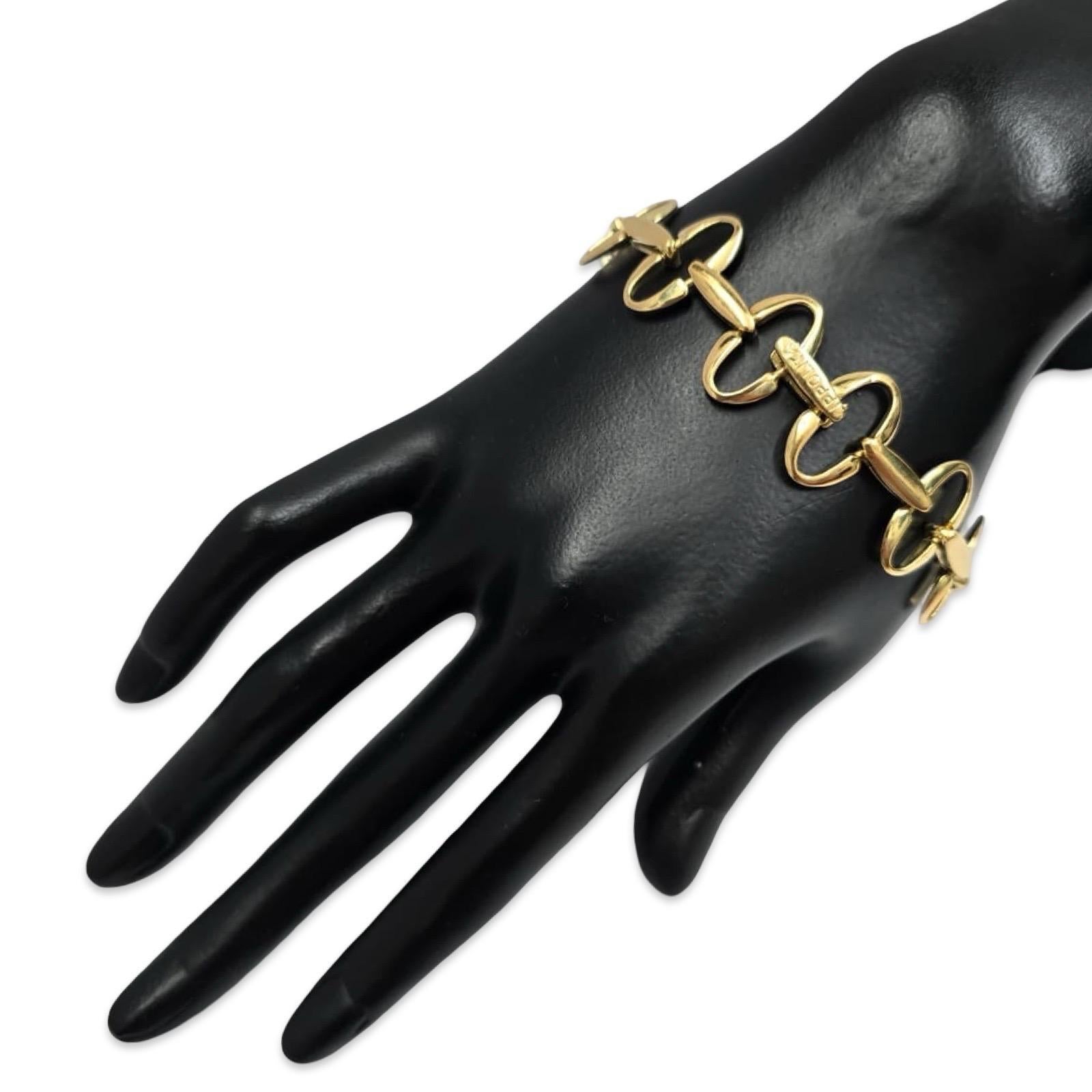 Questo bracciale autentico in oro giallo 18 carati, dal design audace e fluido, è caratterizzato da maglie scultoree ovali aperte con una finitura lucida e senza soluzione di continuità. Con una lunghezza di circa 7,5 pollici e una larghezza di