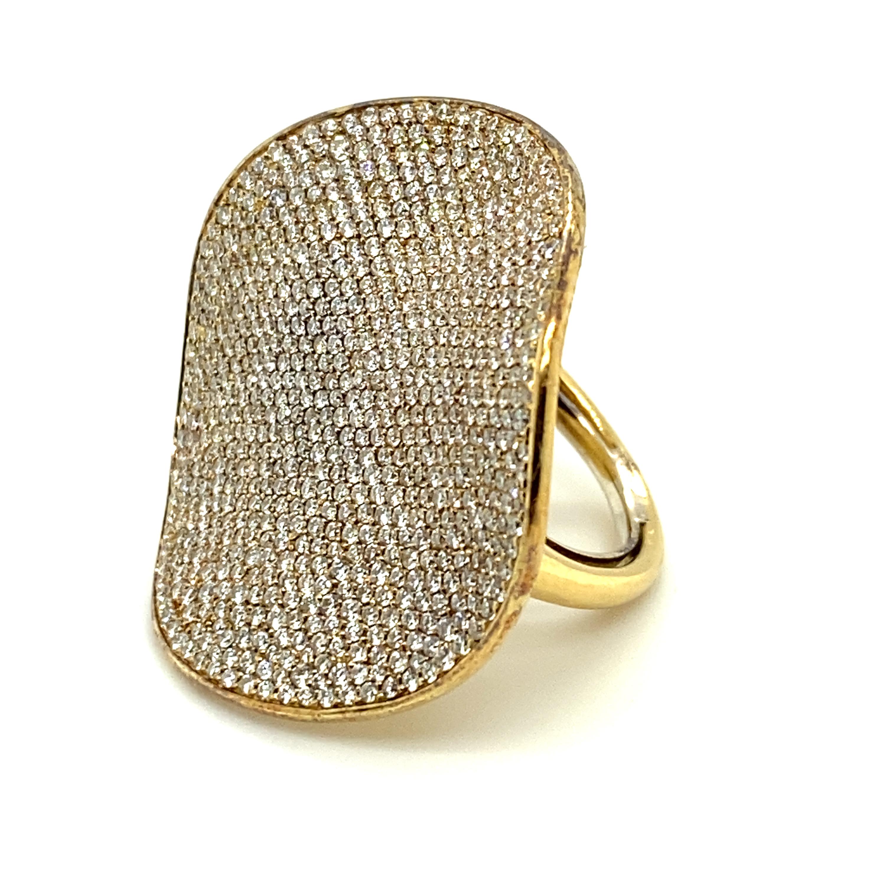This Ippolita ring from the Stardust collection contains approximately 2.86cts of pave-set diamonds angled on a curved surface reminiscent of flower petals.  This Large 18k Flower Ring model, which contains diamonds of G-H color and SI clarity,