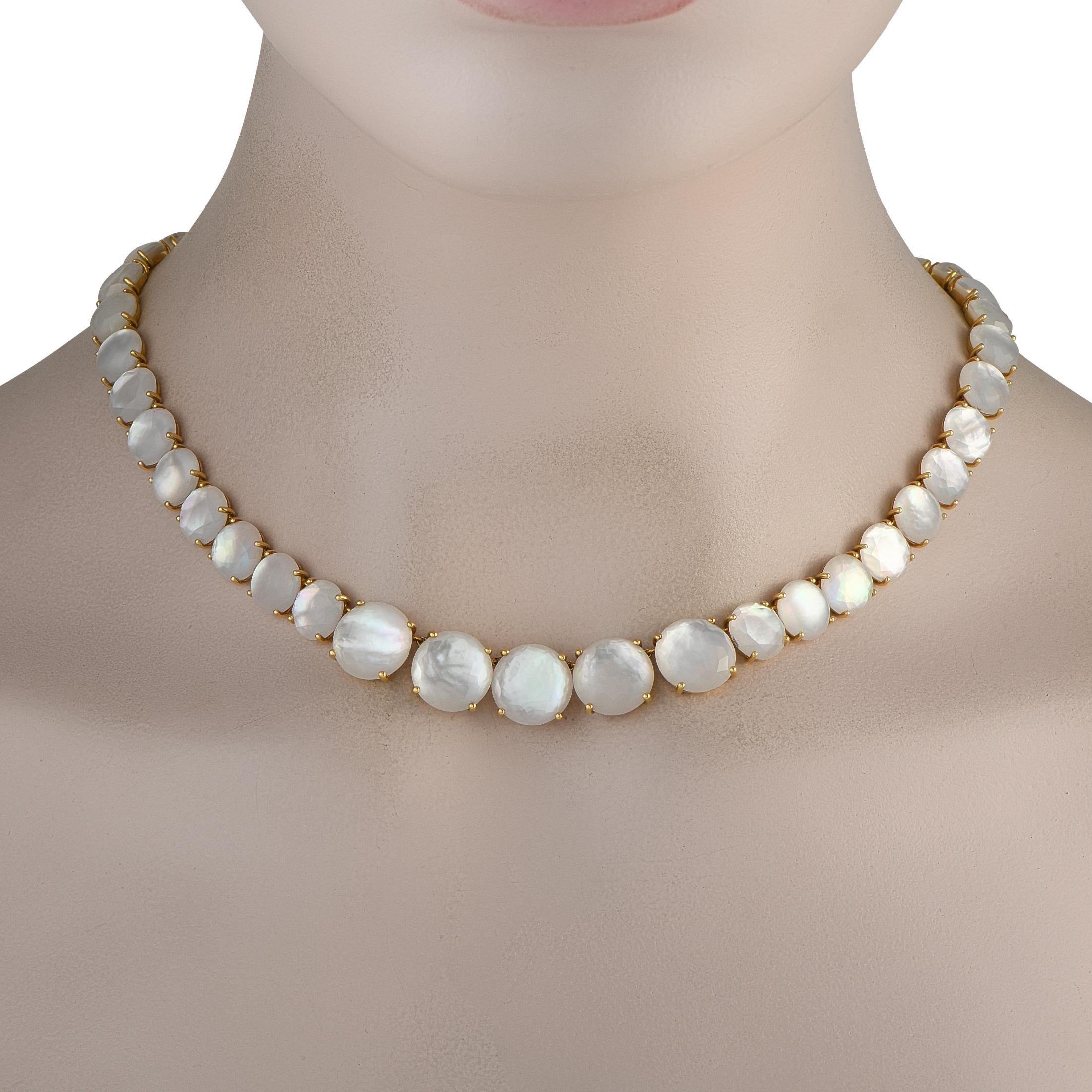 This luminous Ippolita Lollipop necklace offers timeless elegance. On this exquisite accessory, a series of iridescent Mother of Pearl gemstones continually catch the light from their place within a simple 18K Yellow Gold setting. It measures 17