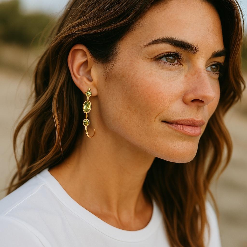These elegant and luxurious 18kt Yellow Gold and Prasiolite Earrings from Ippolita’s Lollipop Collection are the epitome of refined craftsmanship and sophisticated style. Expertly designed, each large hoop earring is meticulously crafted from