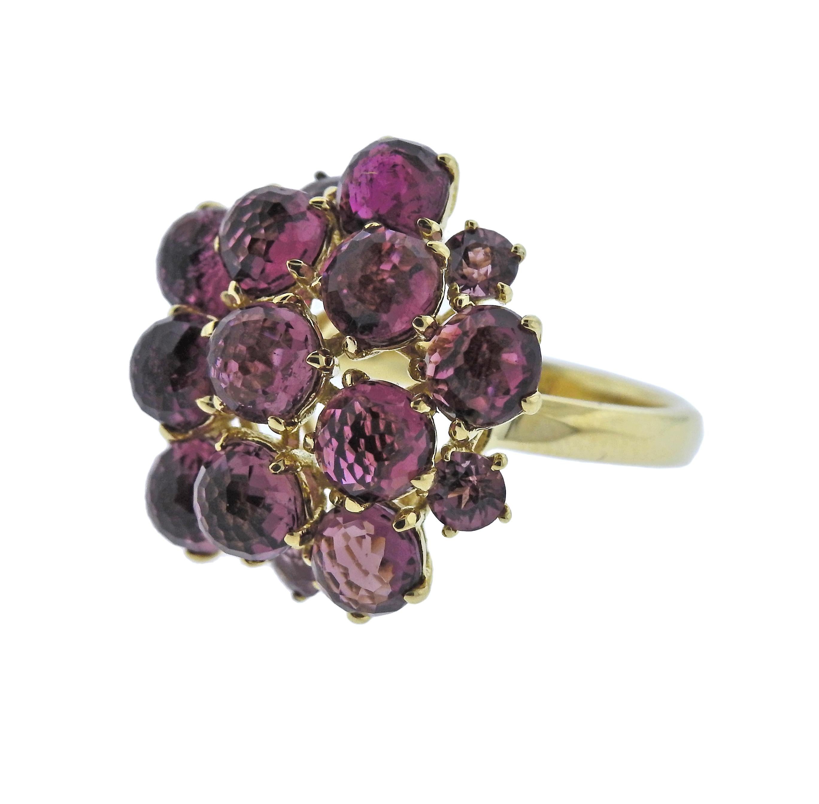 18k gold cocktail ring by Ippolita, set with pink tourmalines and sapphires. Ring size 7 1/4, ring top is 22mm x 23mm, weighs 10.3 grams. Marked Ippolita and 18k.  Retail $3995. Come with Pouch.