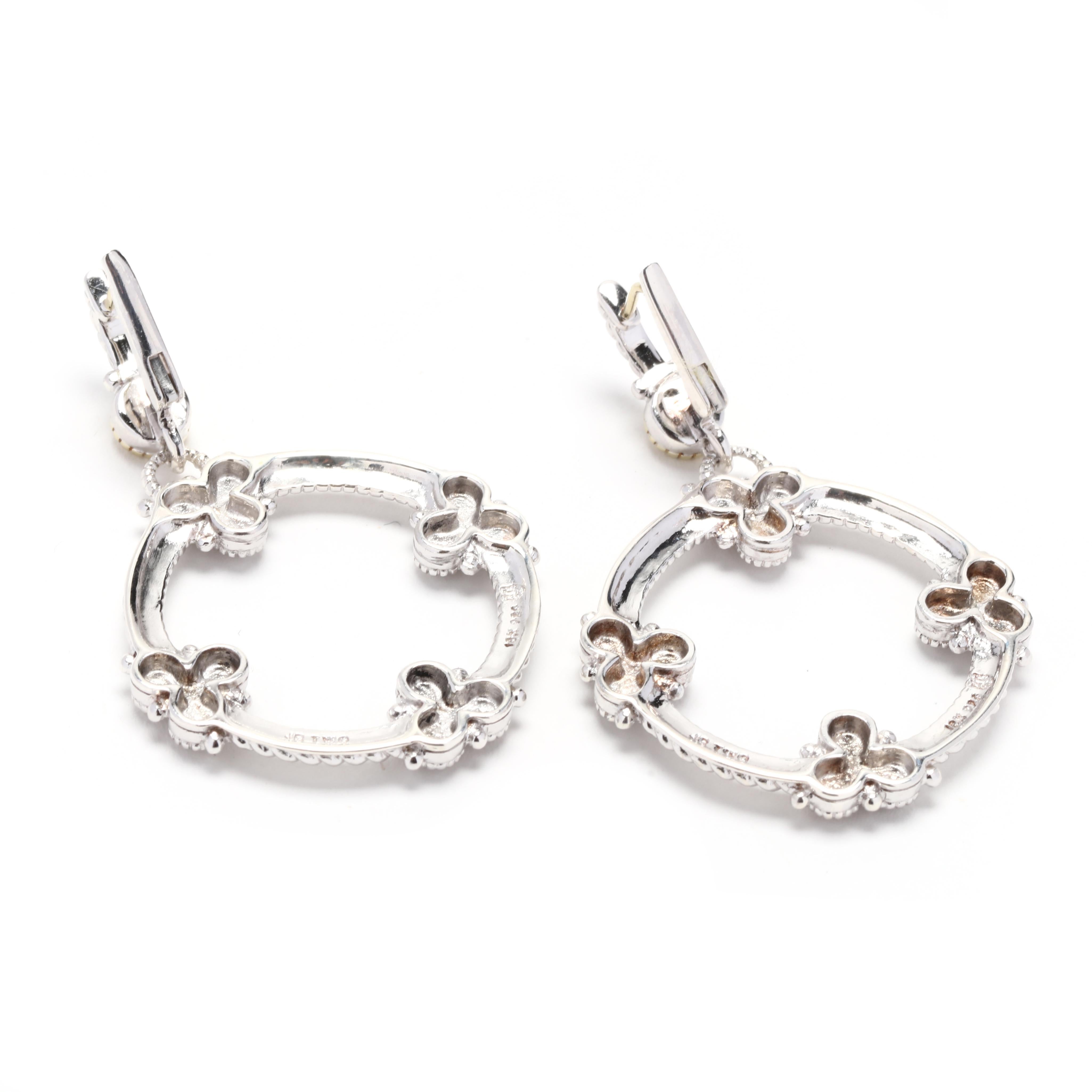 These stunning Judith Ripka Round Diamond Dangle Earrings are a perfect combination of elegance and sophistication. Crafted in 18k yellow gold and sterling silver, these earrings feature a round diamond dangling from a stylish design. The diamonds