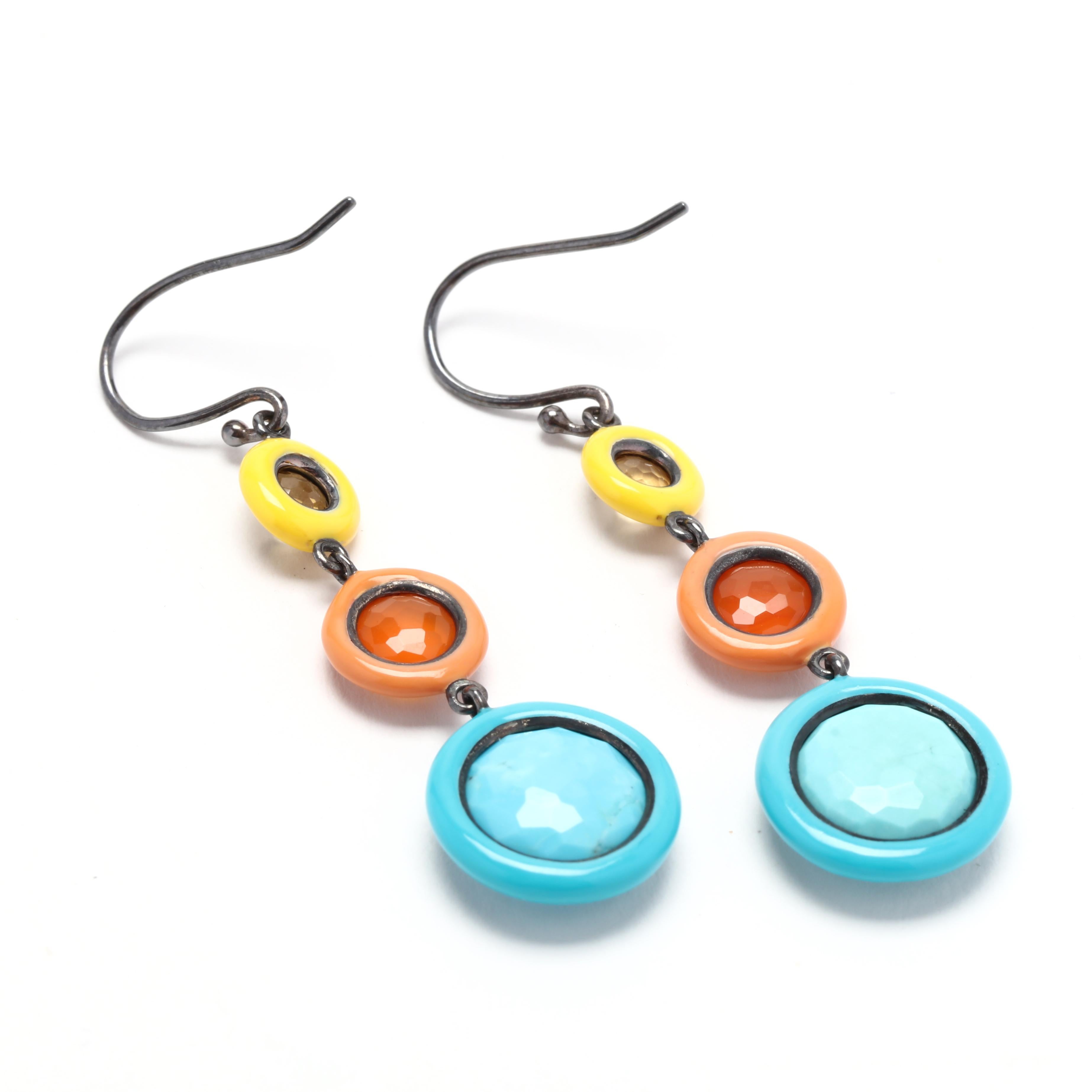 These Ippolita multi-color dangle earrings are a stunning addition to any jewelry collection. Handcrafted with care, they feature vibrant ceramic beads in a variety of complementary colors. Made with sterling silver, these earrings are both durable