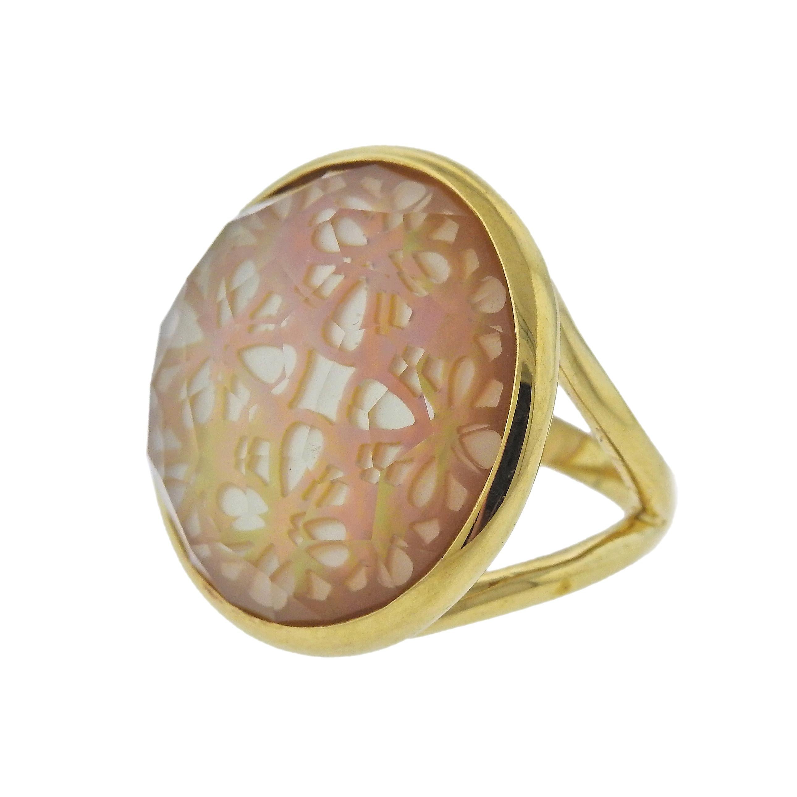 18k gold large ring by Ippolita, set with cut out mother of pearl, covered with quartz. Ring size - 7 1/4, ring top - 25mm in diameter , weighs 17.1 grams. Marked Ippolita and 18k. Retail $2595. Come with Pouch.