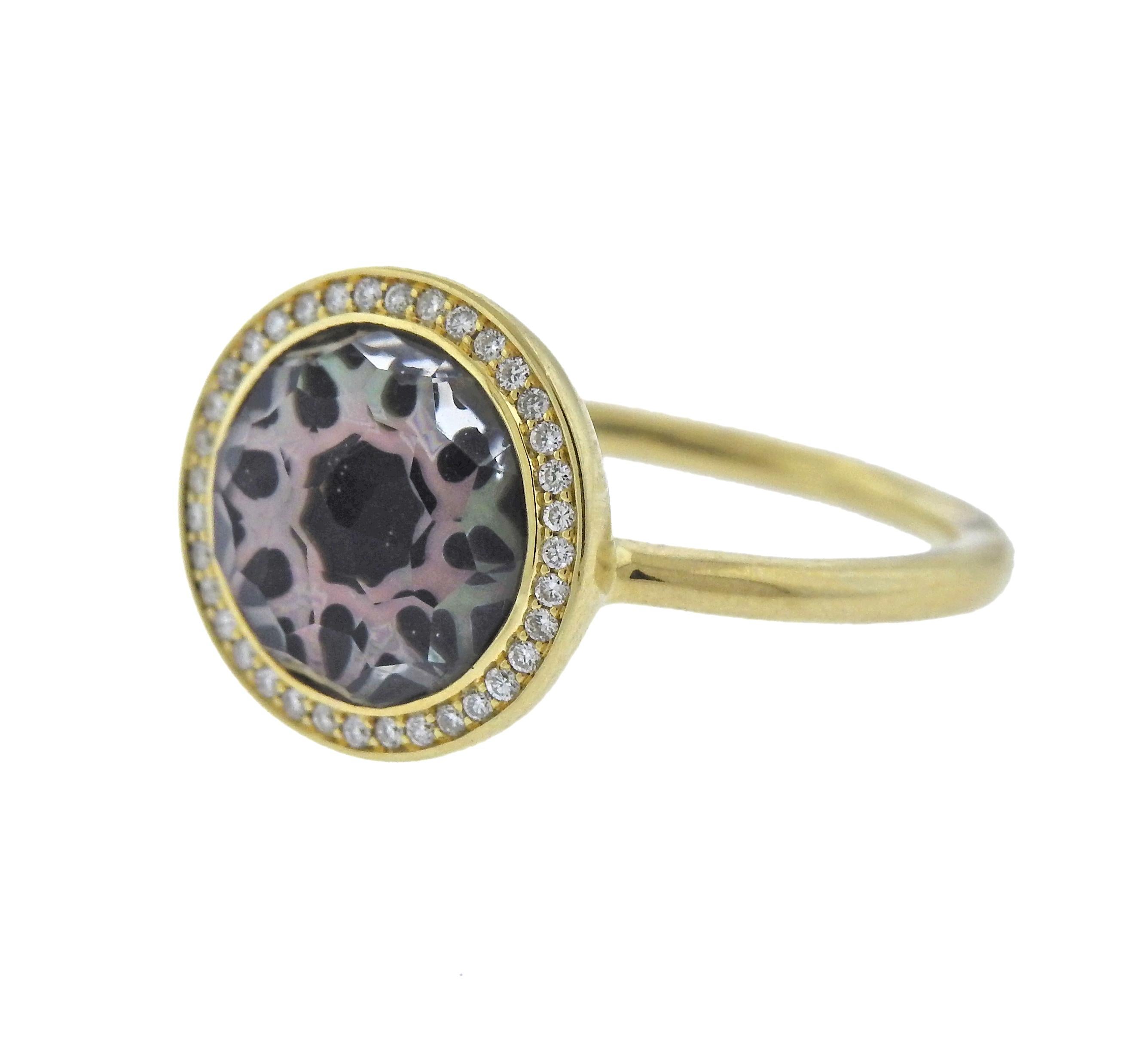 18k gold ring by Ippolita, set with shell and crystal, surrounded with approx. 0.16ctw in diamonds. Ring size 7, top is 13mm in diameter, weighs 4.3 grms. Marked Ippolita and 18k.  Retail $1995. Come with Pouch.