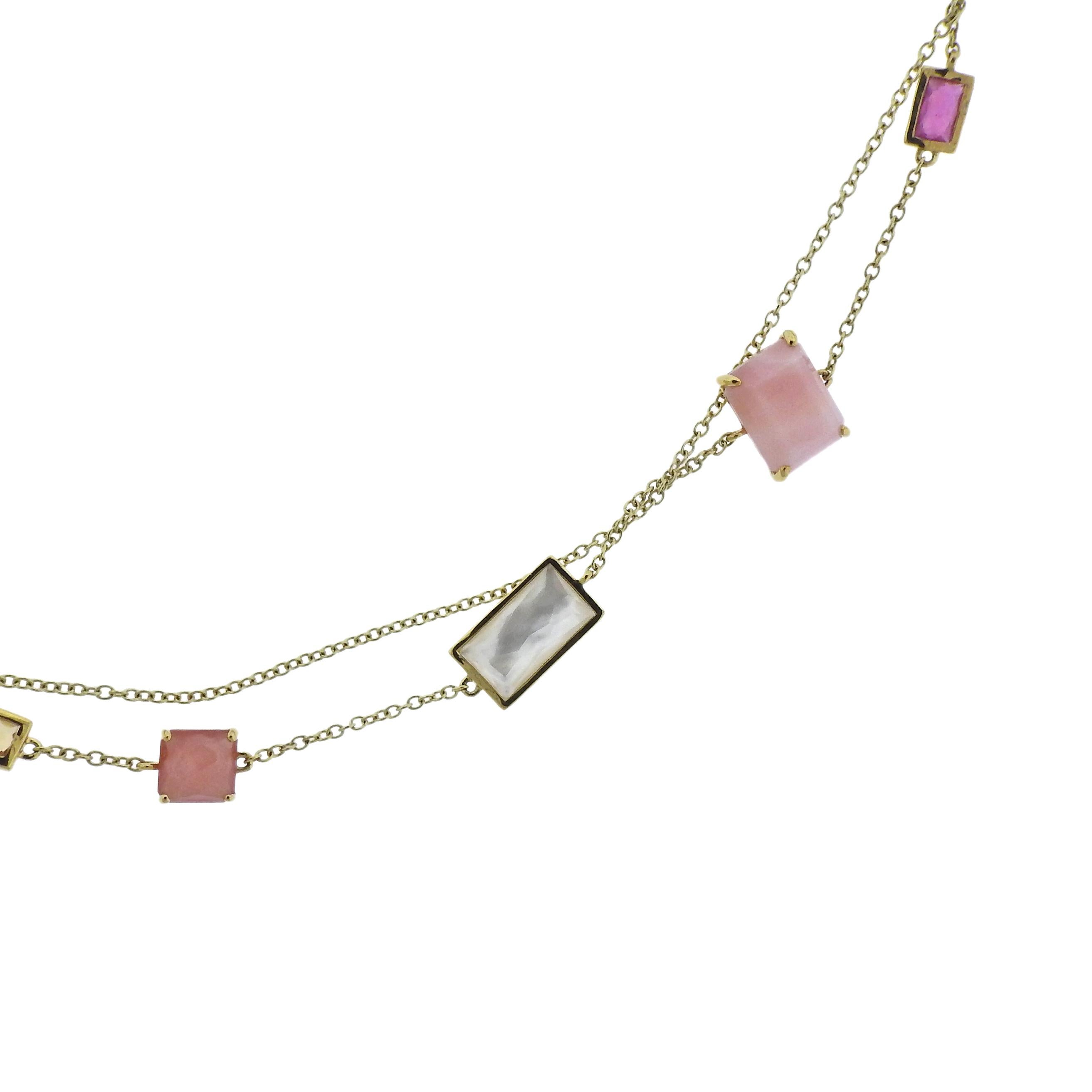 18k gol long station necklace by ippolita, set with Multi color quartz, turquoise, amethyst. Necklace is 36