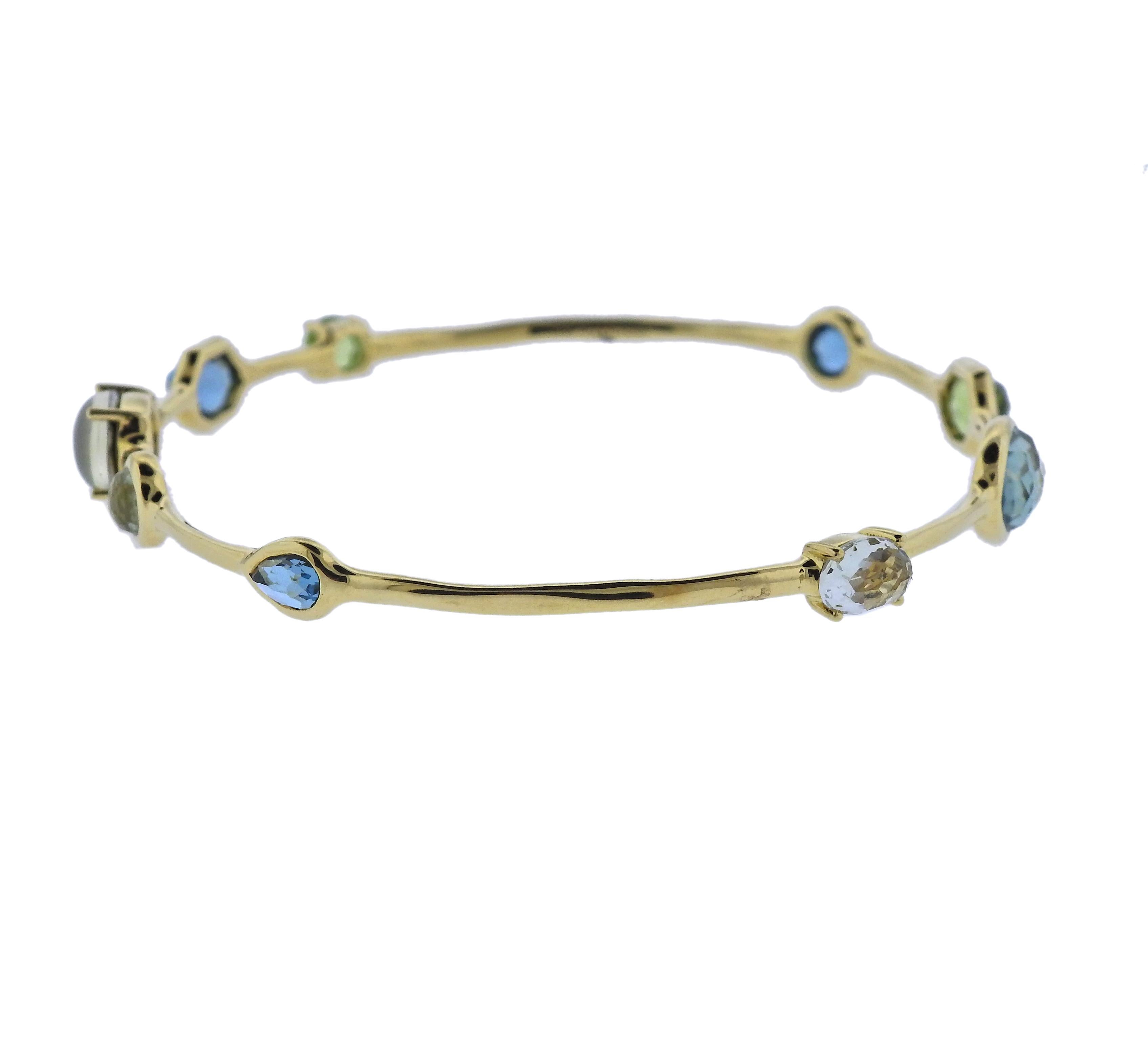 18k gold bangle bracelet by Ippolita, set with Quartz, Topaz, Citrine.  Bracelet will fit approx. 7 1/2 