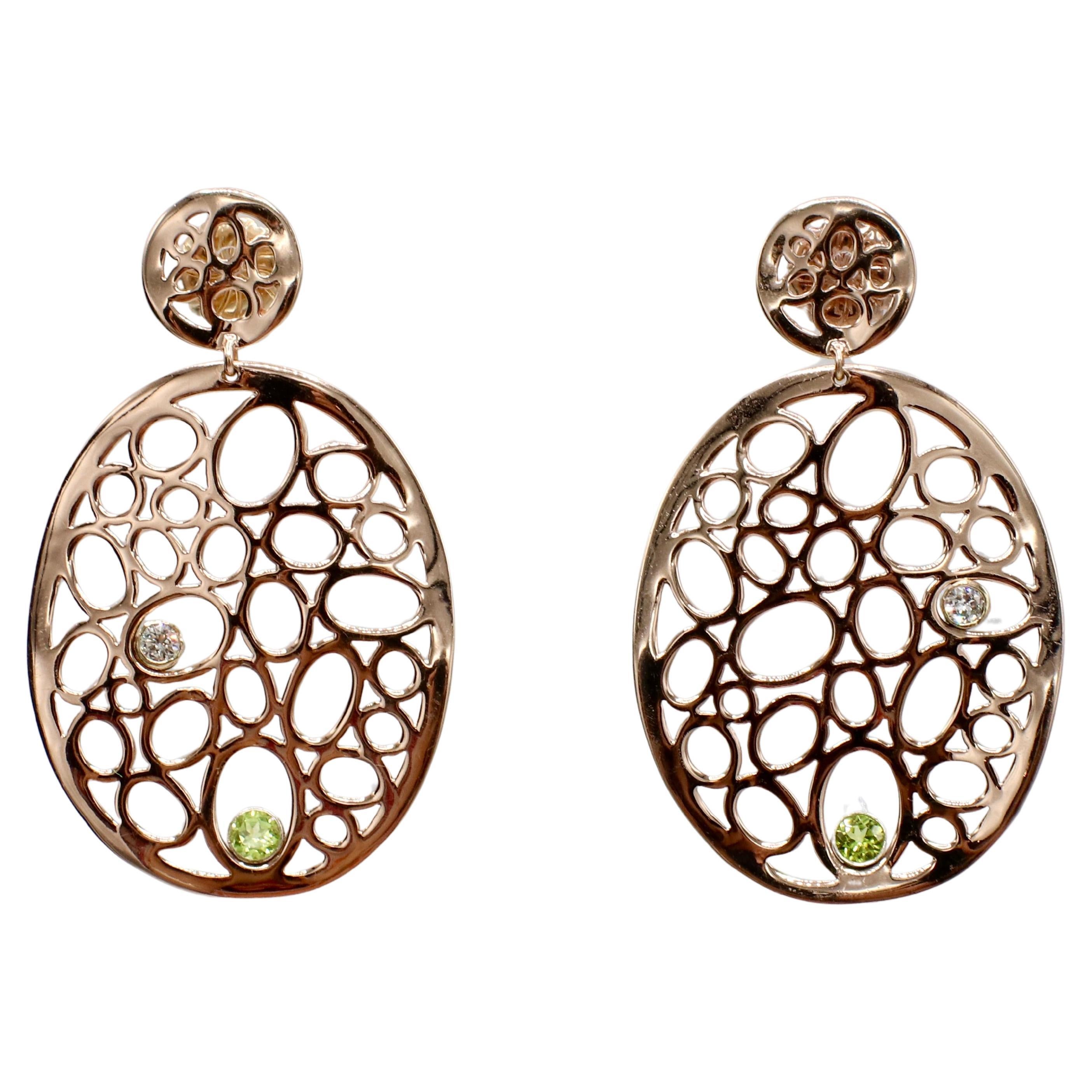 Ippolita Rose Digital Lace Double Drop Natural Diamond & Peridot Earrings 
Metal: 14K rose gold plated over sterling silver 925
Diamonds: Approx. 0.30 CTW G-H SI round natural diamonds
Length: 2.25 inches
Width: 1.50 inches
Weight: 14.41