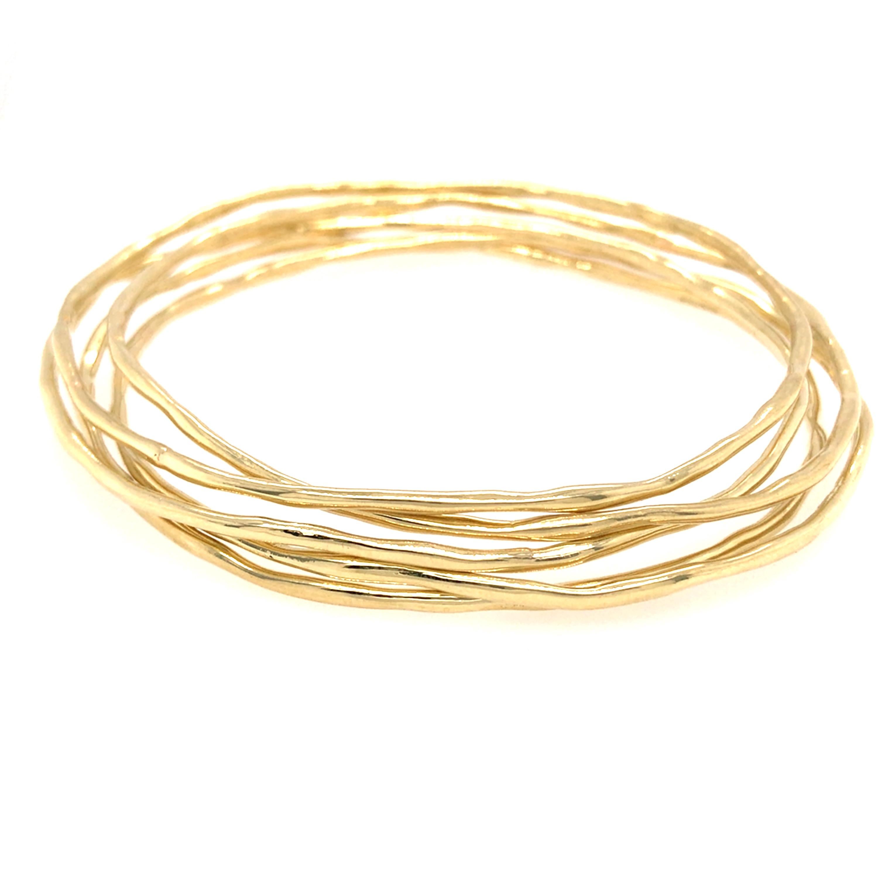 Ippolita set of (5) Wavy Bangles in 18K Yellow Gold. 45.63 grams.